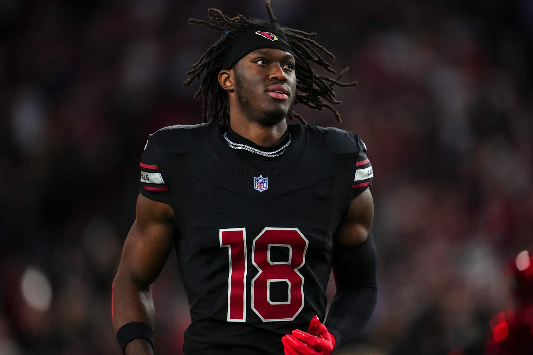 GLENDALE, AZ - OCTOBER 21: Marvin Harrison Jr. #18 of the Arizona Cardinals runs out of the tunnel prior to an NFL football game against the Los Angeles Chargers at State Farm Stadium on October 21, 2024 in Glendale, Arizona. (Photo by Cooper Neill/Getty Images)