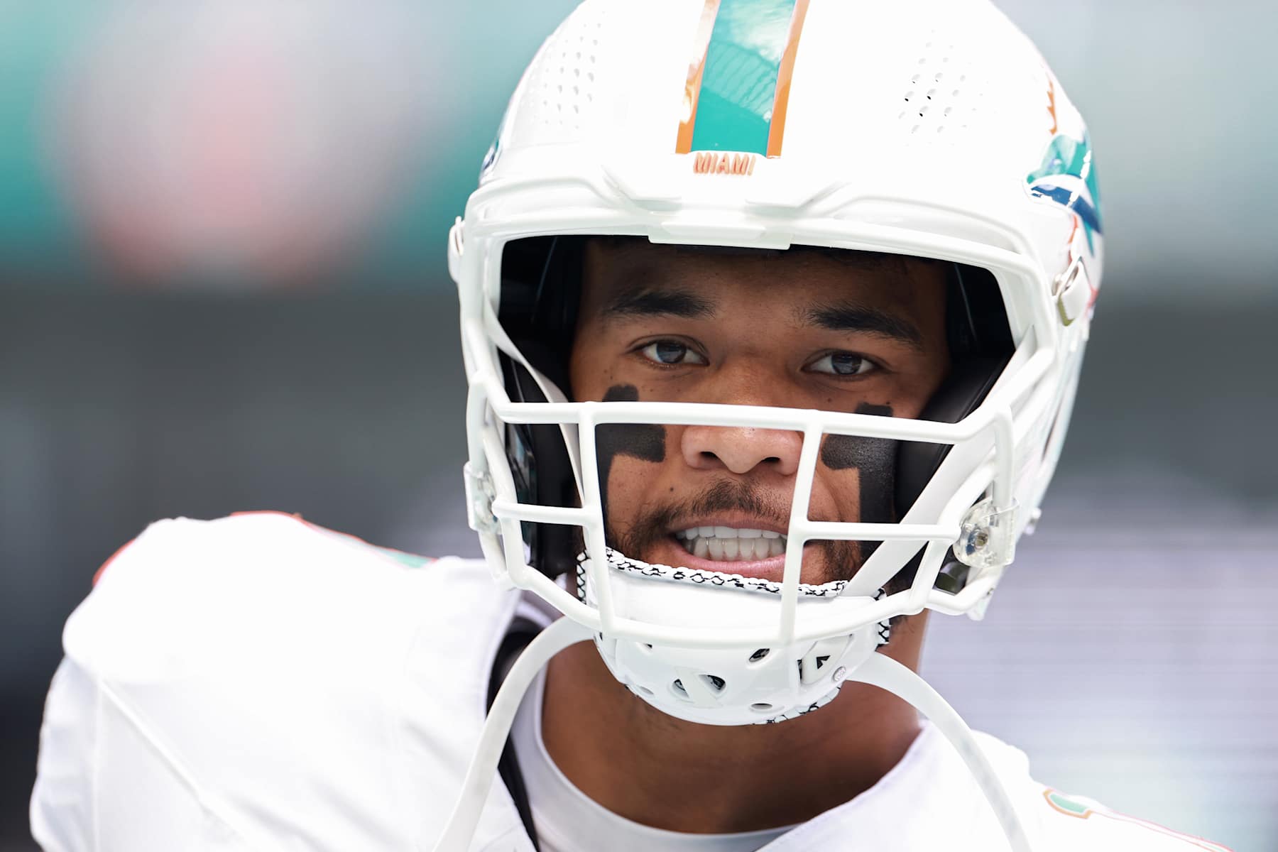 MIAMI GARDENS, FLORIDA - OCTOBER 27: Tua Tagovailoa #1 of the Miami Dolphins looks on prior to a game against the Arizona Cardinals at Hard Rock Stadium on October 27, 2024 in Miami Gardens, Florida. (Photo by Carmen Mandato/Getty Images)