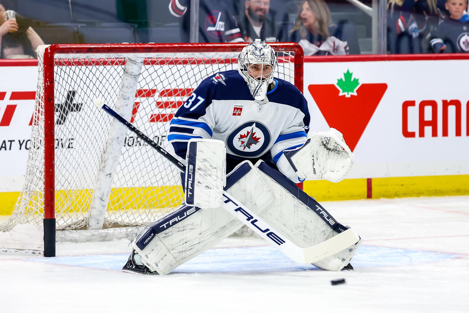 WINNIPEG, CANADA - OCTOBER 28: Goaltender Connor Hellebuyck #37 of the Winnipeg Jets takes part in the pre-game warm up prior to NHL action against the Toronto Maple Leafs at the Canada Life Centre on October 28, 2024 in Winnipeg, Manitoba, Canada. (Photo by Jonathan Kozub/NHLI via Getty Images)