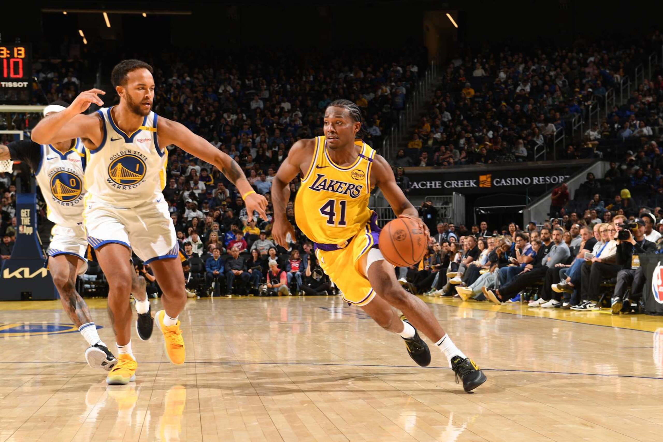 SAN FRANCISCO, CA - OCTOBER 18: Quincy Olivari #41 of the Los Angeles Lakers handles the ball during the game against the Golden State Warriors during a NBA Preseason game on October 18, 2024 at Chase Center in San Francisco, California. NOTE TO USER: User expressly acknowledges and agrees that, by downloading and or using this photograph, user is consenting to the terms and conditions of Getty Images License Agreement. Mandatory Copyright Notice: Copyright 2024 NBAE (Photo by Noah Graham/NBAE via Getty Images)