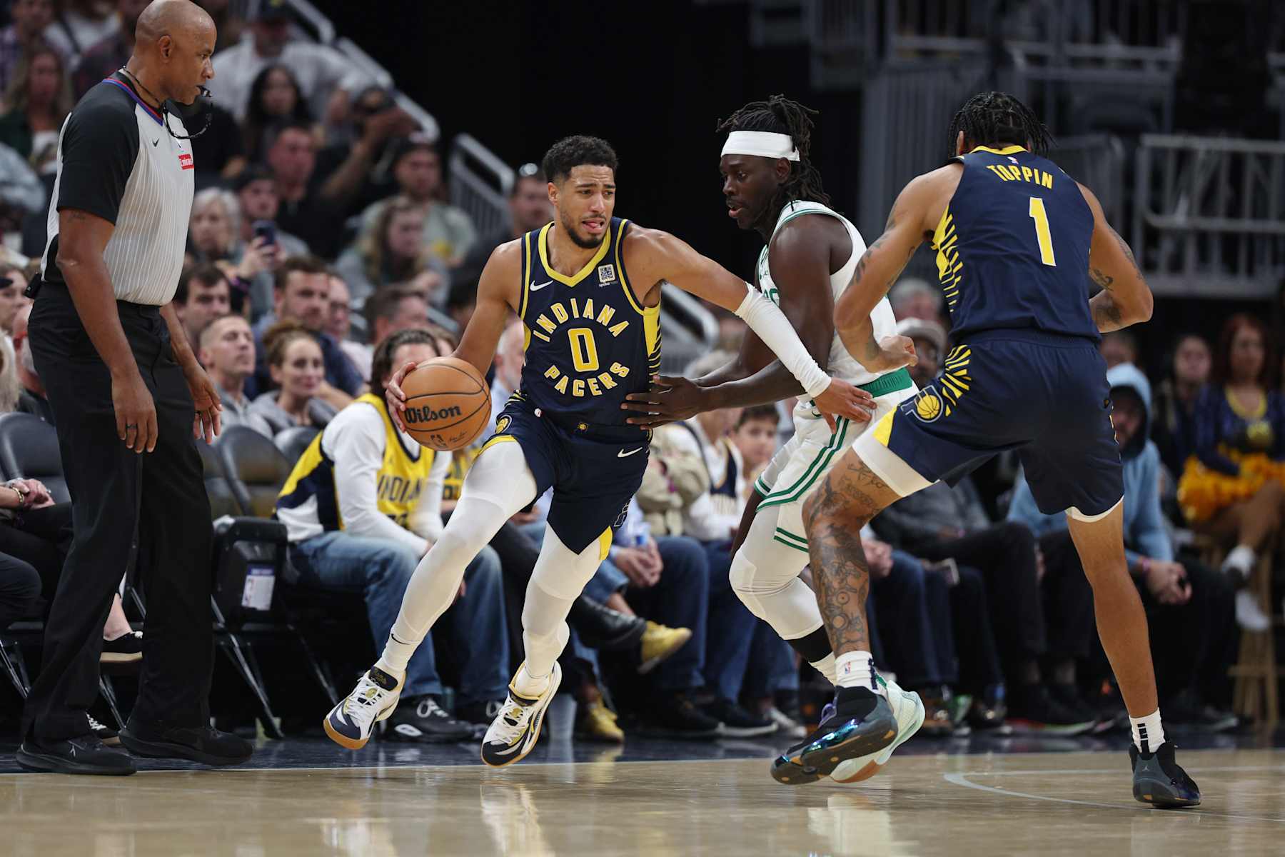INDIANAPOLIS, IN - OCTOBER 30: Tyrese Haliburton #0 of the Indiana Pacers dribbles the ball during the game against the Boston Celtics on October 30, 2024 at Gainbridge Fieldhouse in Indianapolis, Indiana. NOTE TO USER: User expressly acknowledges and agrees that, by downloading and or using this Photograph, user is consenting to the terms and conditions of the Getty Images License Agreement. Mandatory Copyright Notice: Copyright 2024 NBAE (Photo by Michael Hickey/NBAE via Getty Images)
