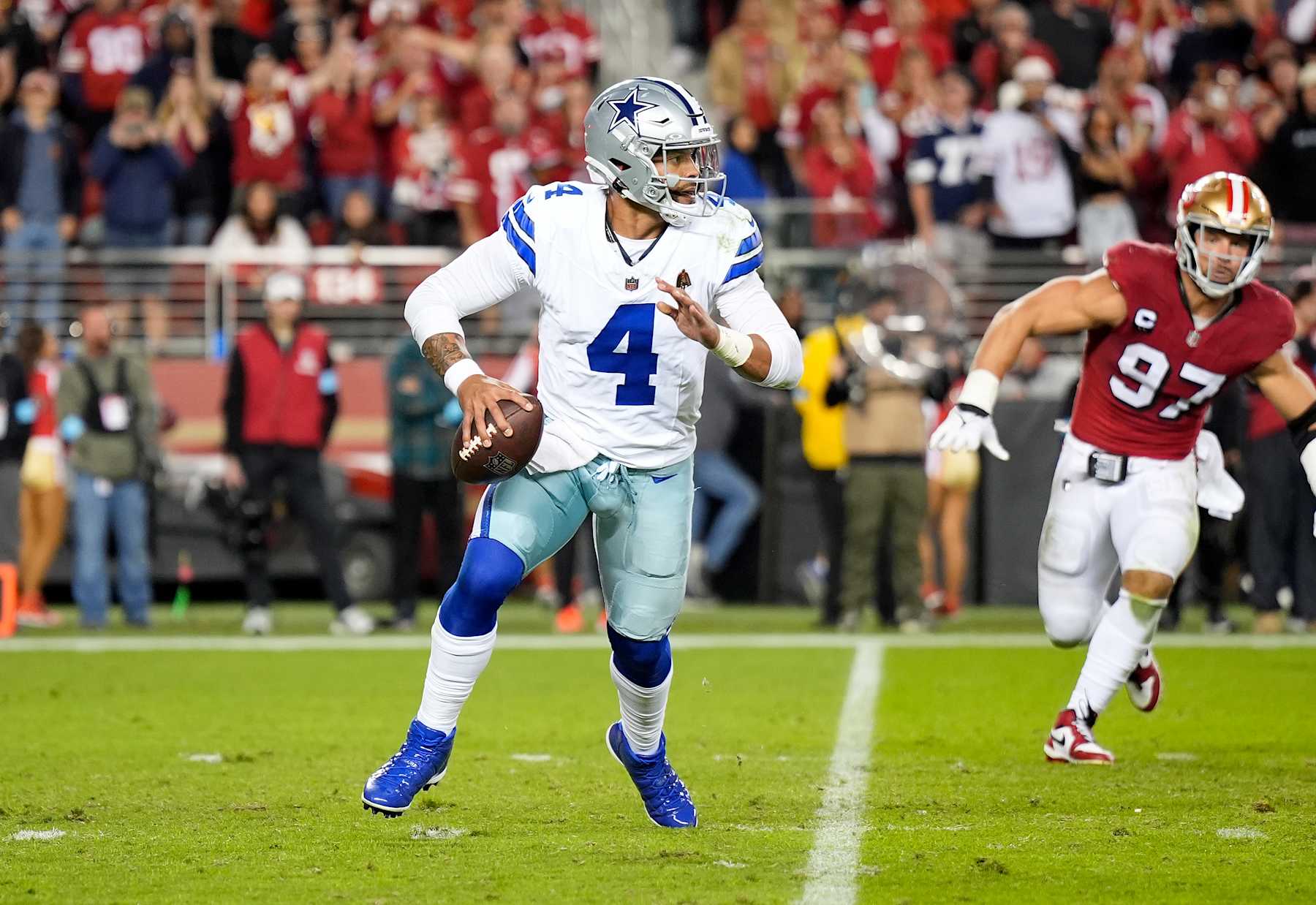 SANTA CLARA, CALIFORNIA - OCTOBER 27: Dak Prescott #4 of the Dallas Cowboys scrambling with the ball throws a pass against the San Francisco 49ers during the fourth quarter of an NFL football game at Levi's Stadium on October 27, 2024 in Santa Clara, California. (Photo by Thearon W. Henderson/Getty Images)