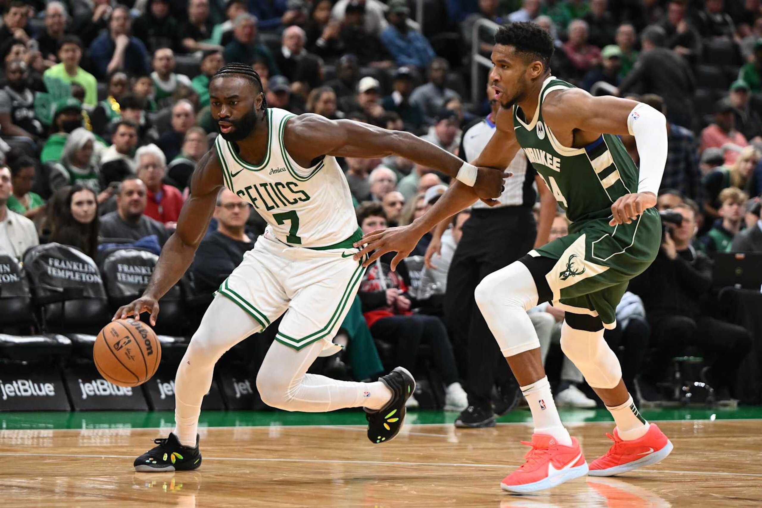 BOSTON, MASSACHUSETTS - OCTOBER 28: Jaylen Brown #7 of the Boston Celtics drives to the basket against Giannis Antetokounmpo #34 of the Milwaukee Bucks during the second half at the TD Garden on October 28, 2024 in Boston, Massachusetts. NOTE TO USER: User expressly acknowledges and agrees that, by downloading and or using this photograph, User is consenting to the terms and conditions of the Getty Images License Agreement. (Photo by Brian Fluharty/Getty Images)