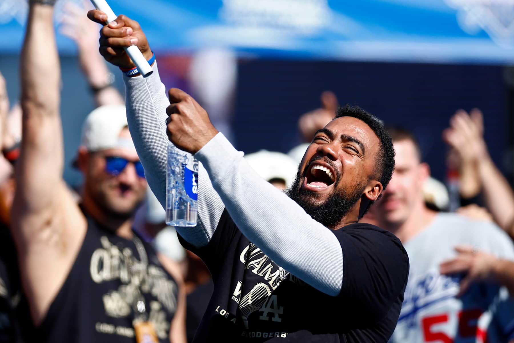 LOS ANGELES, CALIFORNIA - NOVEMBER 01: Teoscar Hernandez #37 of the Los Angeles Dodgers celebrates during the 2024 World Series Celebration Show at Dodger Stadium on November 01, 2024 in Los Angeles, California.  (Photo by Ronald Martinez/Getty Images)