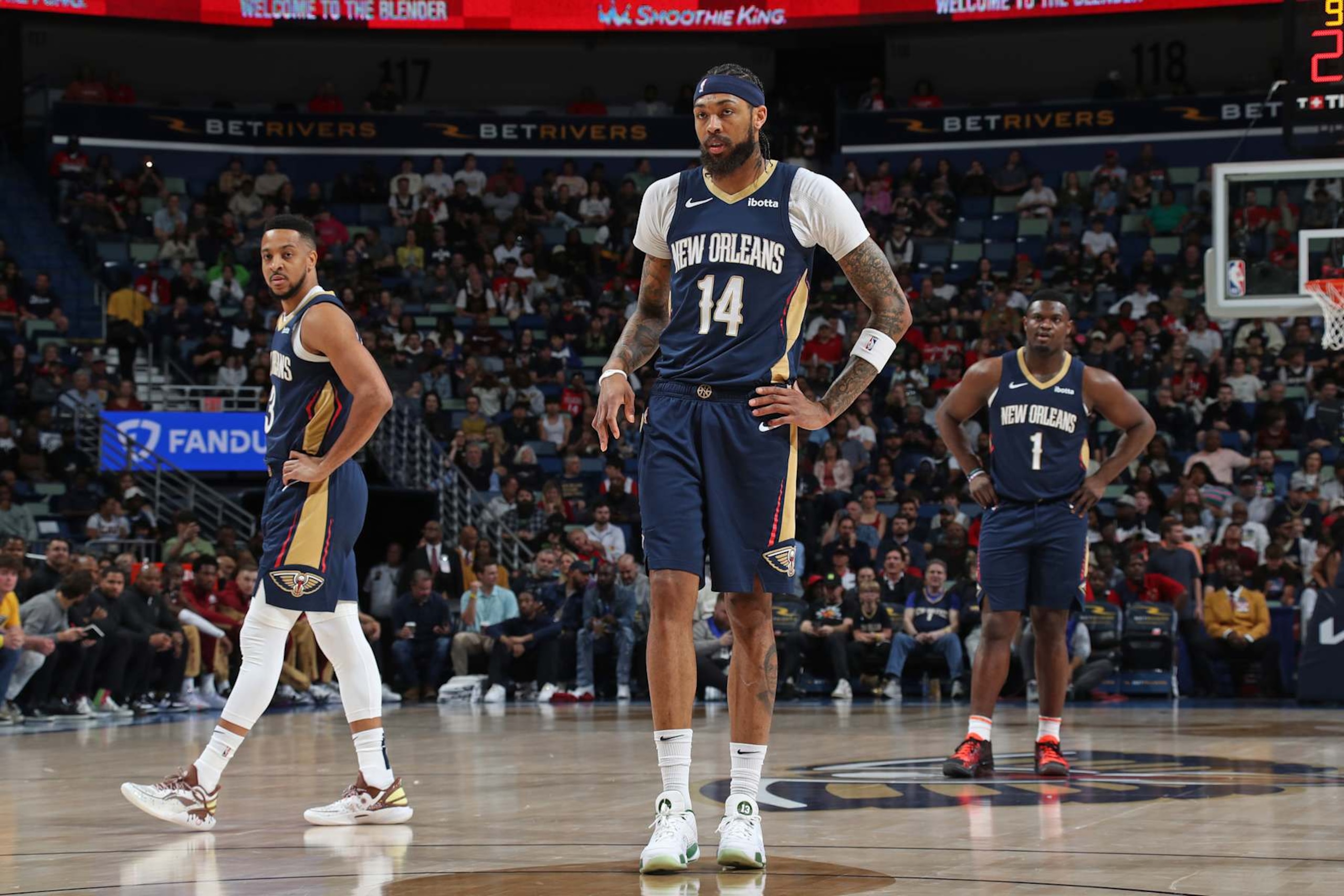 NEW ORLEANS, LA - MARCH 13: CJ McCollum #3, Brandon Ingram #14, and Zion Williamson #1 of the New Orleans Pelicans look on during the game against the Cleveland Cavaliers on March 13, 2024 at the Smoothie King Center in New Orleans, Louisiana. NOTE TO USER: User expressly acknowledges and agrees that, by downloading and or using this Photograph, user is consenting to the terms and conditions of the Getty Images License Agreement. Mandatory Copyright Notice: Copyright 2024 NBAE (Photo by Layne Murdoch Jr./NBAE via Getty Images)