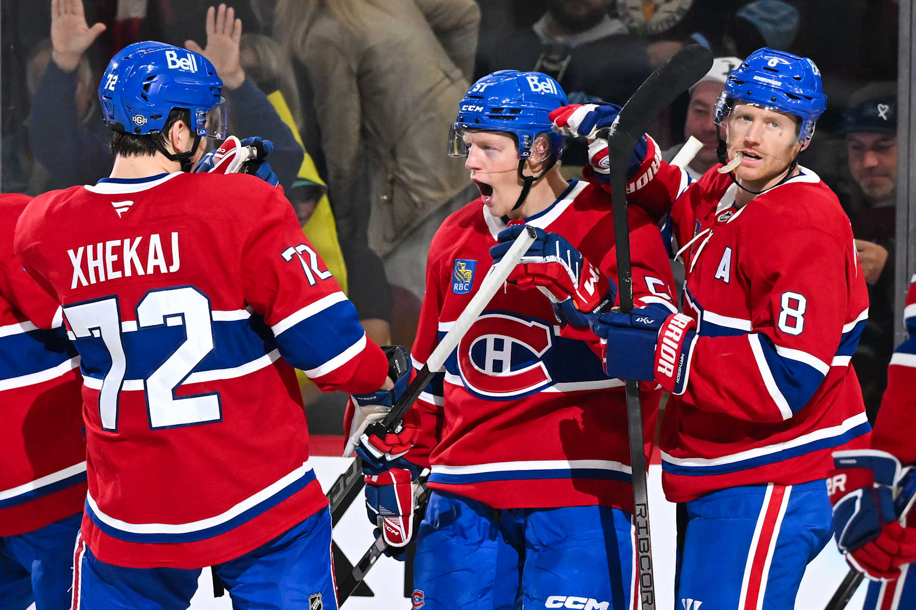 MONTREAL, CANADA - OCTOBER 14: Emil Heineman #51 of the Montreal Canadiens celebrates his goal with teammates Arber Xhekaj #72 and Mike Matheson #8 during the second period against the Pittsburgh Penguins at the Bell Centre on October 14, 2024 in Montreal, Quebec, Canada. The Pittsburgh Penguins defeated the Montreal Canadiens 6-3. (Photo by Minas Panagiotakis/Getty Images)