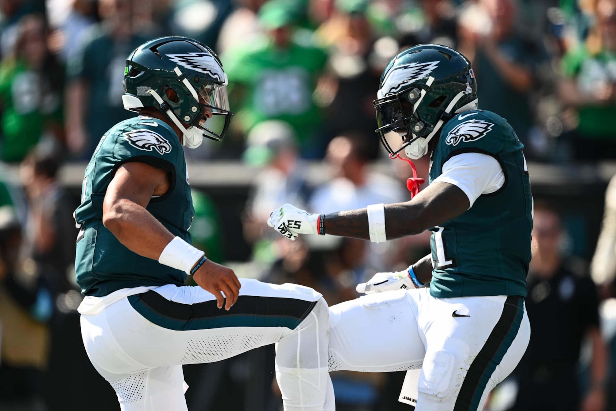 PHILADELPHIA, PA - OCTOBER 13: Philadelphia Eagles wide receiver A.J. Brown (11) celebrates with quarterback Jalen Hurts (1) after scoring a touchdown in the second quarter during the game between the Cleveland Browns and Philadelphia Eagles on October 13, 2024 at Lincoln Financial Field in Philadelphia, PA. (Photo by Kyle Ross/Icon Sportswire via Getty Images)