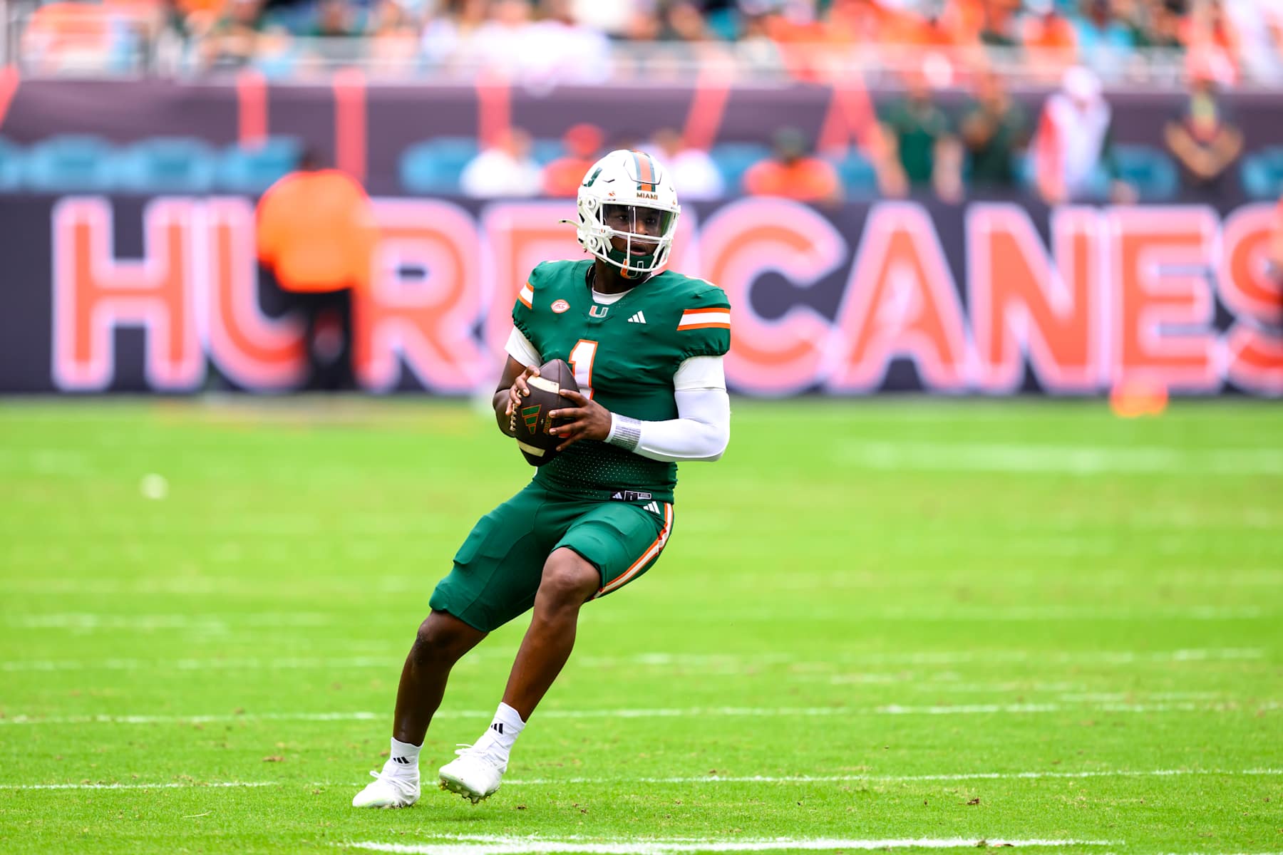MIAMI GARDENS, FL - NOVEMBER 02: Miami quarterback Cam Ward (1) looks to throw the ball Miami wide receiver Xavier Restrepo (not shown) for a touchdown during the college football game between the Duke Blue Devils and the University of Miami Hurricanes on November 2, 2024 at the Hard Rock Stadium in Miami Gardens, FL. (Photo by Doug Murray/Icon Sportswire via Getty Images)