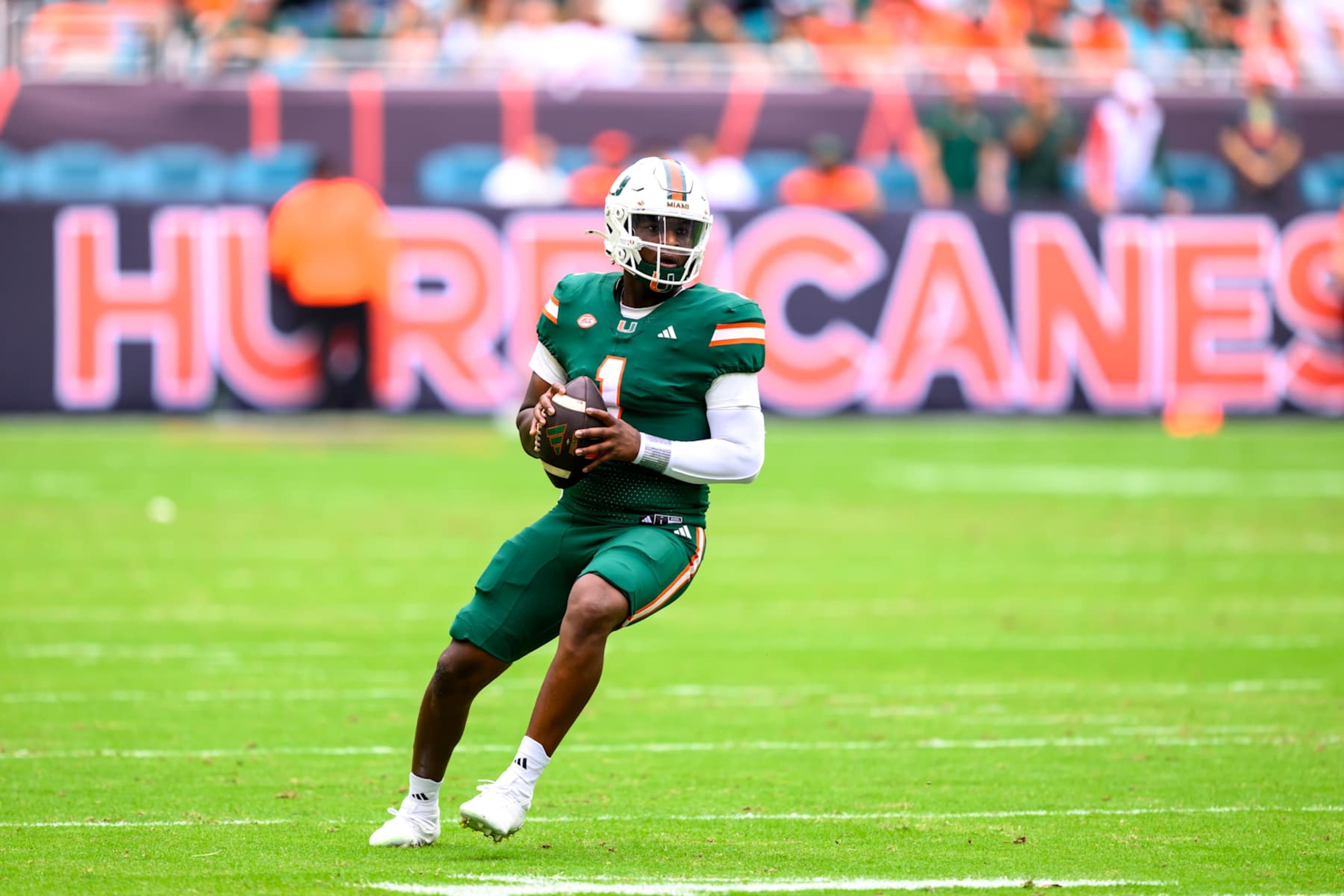 MIAMI GARDENS, FL - NOVEMBER 02: Miami quarterback Cam Ward (1) looks to throw the ball Miami wide receiver Xavier Restrepo (not shown) for a touchdown during the college football game between the Duke Blue Devils and the University of Miami Hurricanes on November 2, 2024 at the Hard Rock Stadium in Miami Gardens, FL. (Photo by Doug Murray/Icon Sportswire via Getty Images)