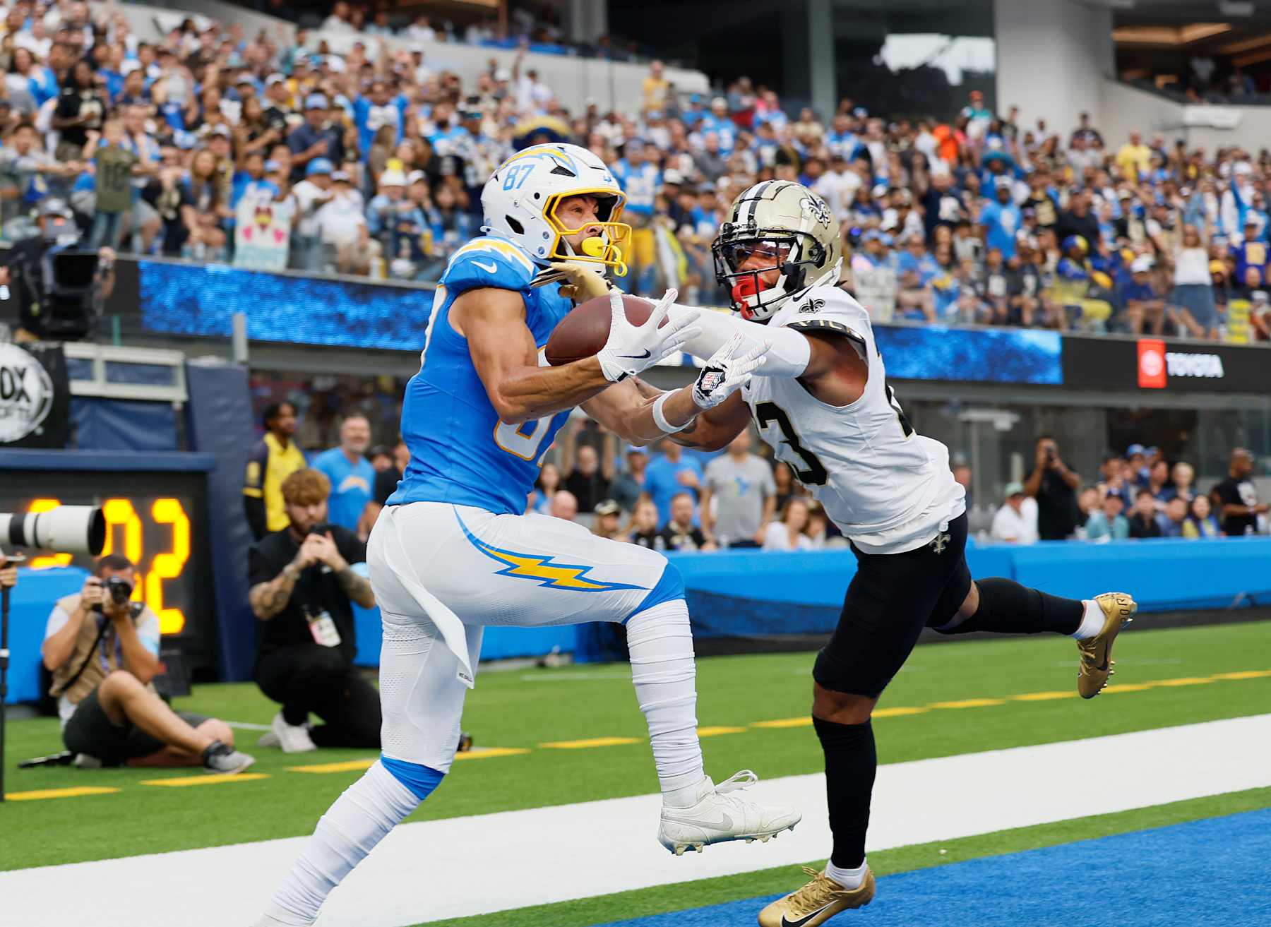 Los Angeles, CA - October 27:  Saints corner back Marshon Lattimore, #23, right, reaches in as Chargers wide receiver Simi Fehoko, #87, hauls in a touchdown pass that was ruled incomplete in the second quarter at SoFi Stadium in Los Angeles Sunday, Oct. 27, 2024.  (Allen J. Schaben / Los Angeles Times via Getty Images)