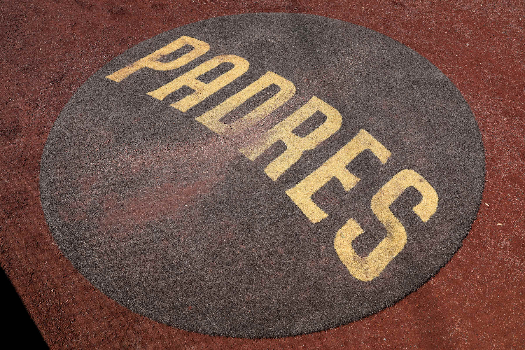 SAN DIEGO, CALIFORNIA - APRIL 3: Detail view of the batters circle with a San Diego Padres logo prior to a game against the St. Louis Cardinals at PETCO Park on April 3, 2024 in San Diego, California. (Photo by Brandon Sloter/Getty Images)
