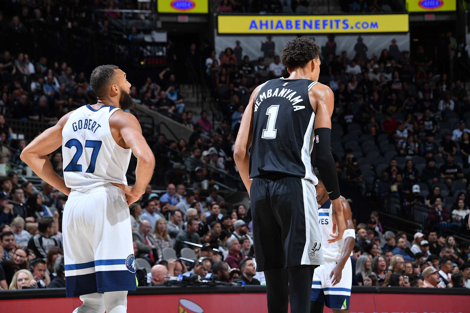 SAN ANTONIO, TX - NOVEMBER 2: Rudy Gobert #27 of the Minnesota Timberwolves and Victor Wembanyama #1 of the San Antonio Spurs look on during the game on November 2, 2024 at the Frost Bank Center in San Antonio, Texas. NOTE TO USER: User expressly acknowledges and agrees that, by downloading and or using this photograph, user is consenting to the terms and conditions of the Getty Images License Agreement. Mandatory Copyright Notice: Copyright 2024 NBAE (Photos by Michael Gonzales/NBAE via Getty Images)
