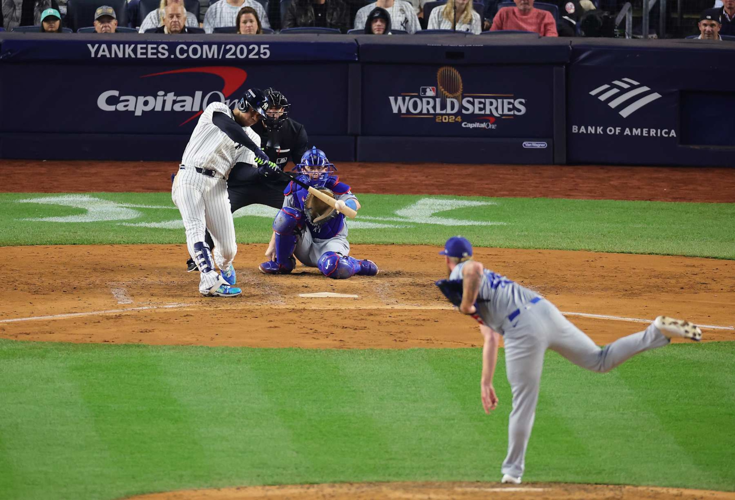 NEW YORK, NEW YORK - OCTOBER 30:  Juan Soto #22 of the New York Yankees hits a single during the fourth inning of Game Five of the 2024 World Series against the Los Angeles Dodgers at Yankee Stadium on October 30, 2024 in the Bronx borough of New York City. (Photo by Alex Slitz/Getty Images)