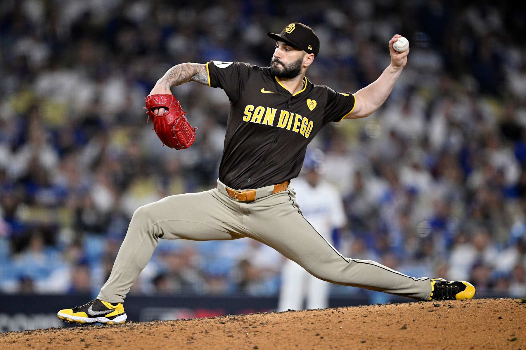 LOS ANGELES, CALIFORNIA - OCTOBER 06: Tanner Scott #66 of the San Diego Padres pitches in the eighth inning against the Los Angeles Dodgers during Game Two of the Division Series at Dodger Stadium on October 06, 2024 in Los Angeles, California. (Photo by Orlando Ramirez/Getty Images)