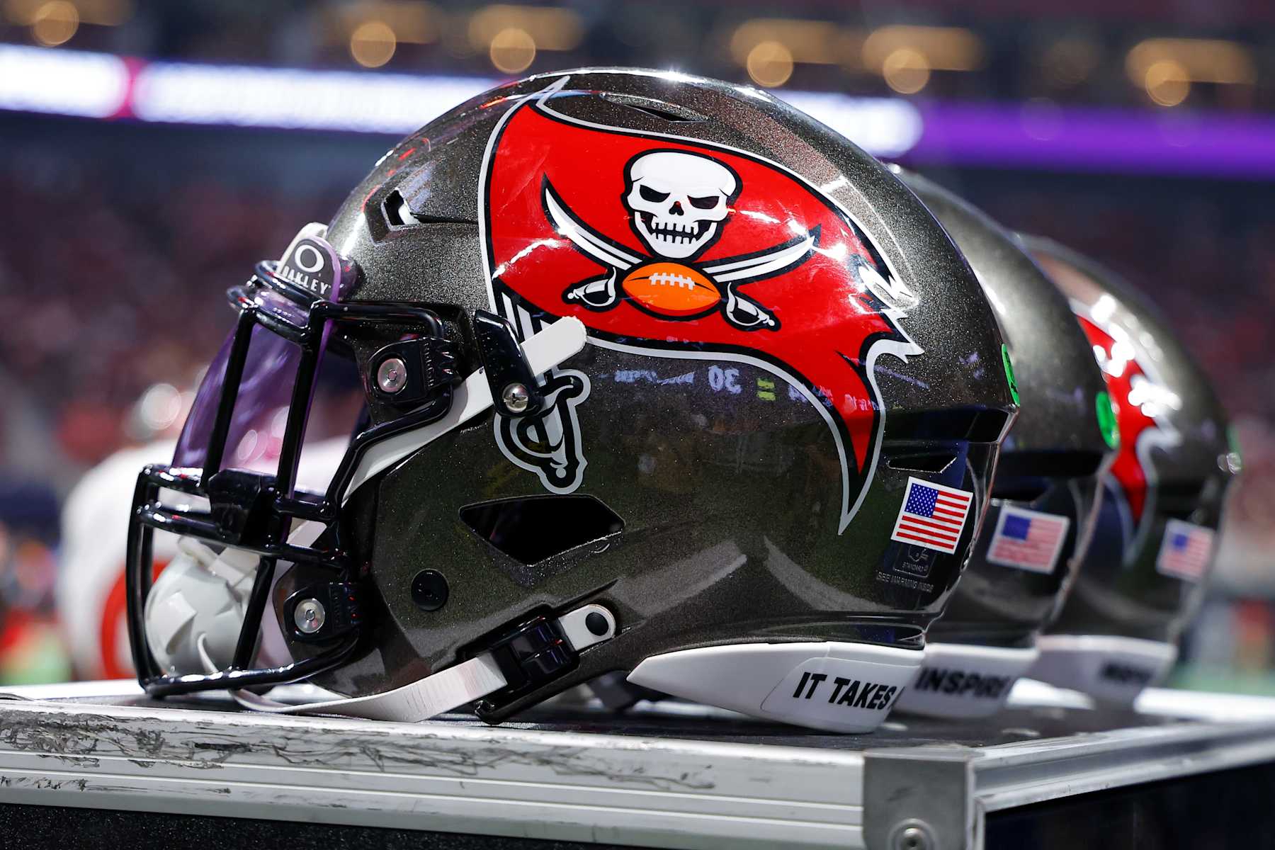 ATLANTA, GEORGIA - OCTOBER 3: Tampa Bay Buccaneers helmets are lined up in the bench area during the fourth quarter against the Atlanta Falcons at Mercedes-Benz Stadium on October 3, 2024 in Atlanta, Georgia. (Photo by Todd Kirkland/Getty Images)