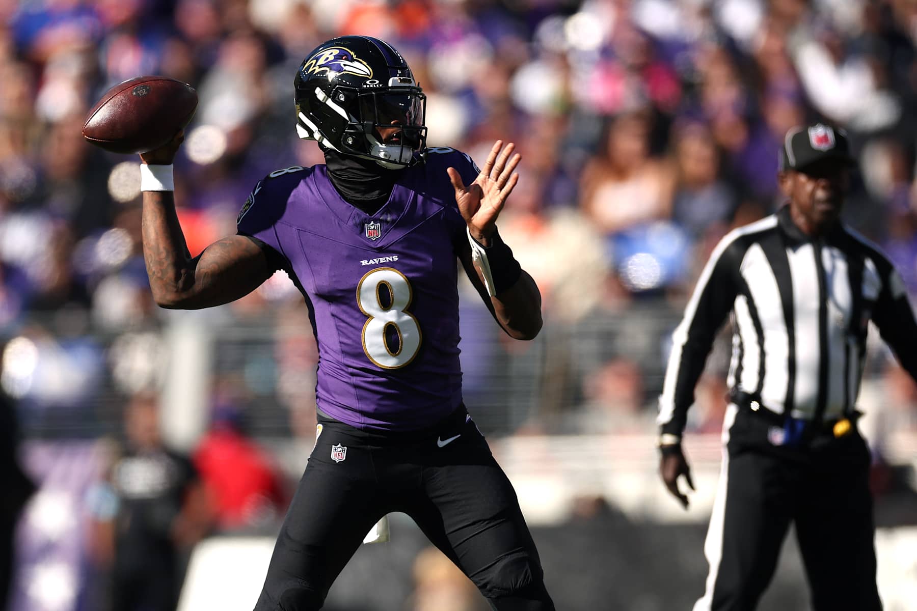 BALTIMORE, MARYLAND - NOVEMBER 03: Lamar Jackson #8 of the Baltimore Ravens looks to pass in the first quarter of a game against the Denver Broncos at M&T Bank Stadium on November 03, 2024 in Baltimore, Maryland. (Photo by Scott Taetsch/Getty Images)