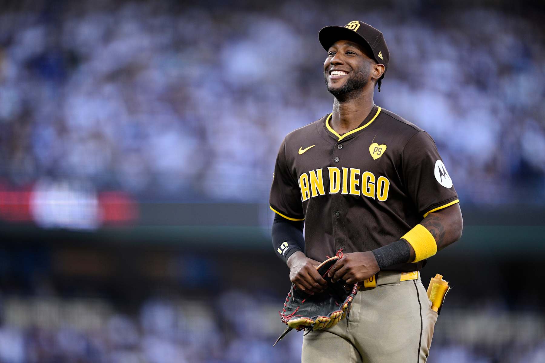 LOS ANGELES, CALIFORNIA - OCTOBER 06: Jurickson Profar #10 of the San Diego Padres walks across the field in the third inning against the Los Angeles Dodgers during Game Two of the Division Series at Dodger Stadium on October 06, 2024 in Los Angeles, California. (Photo by Orlando Ramirez/Getty Images)
