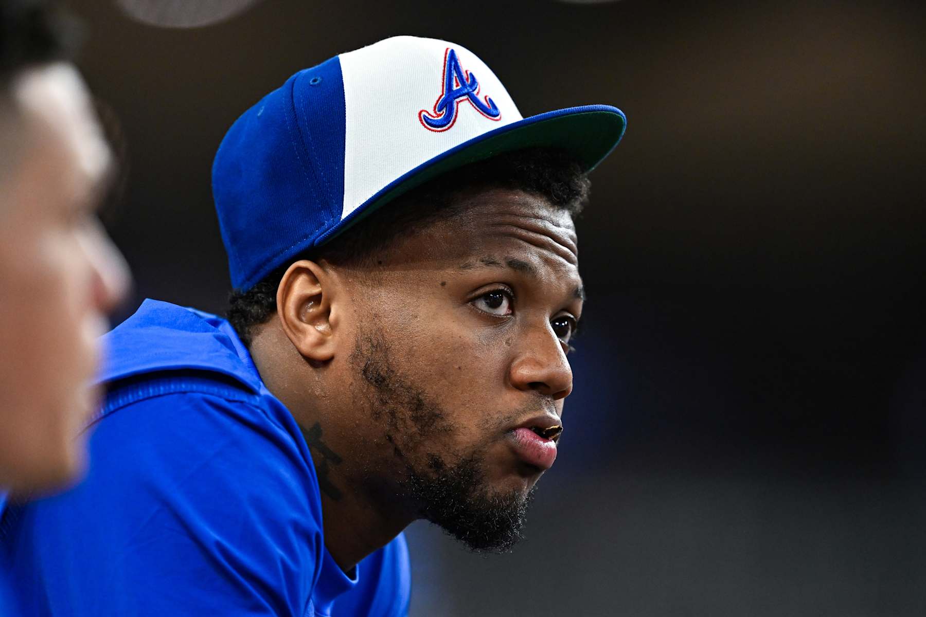 ATLANTA, GA  SEPTEMBER 28:  Injured Atlanta outfielder Ronald Acuna (13) looks on from the dugout during the MLB game between the Kansas City Royals and the Atlanta Braves on September 28th, 2024 at Truist Park in Atlanta, GA. (Photo by Rich von Biberstein/Icon Sportswire via Getty Images)