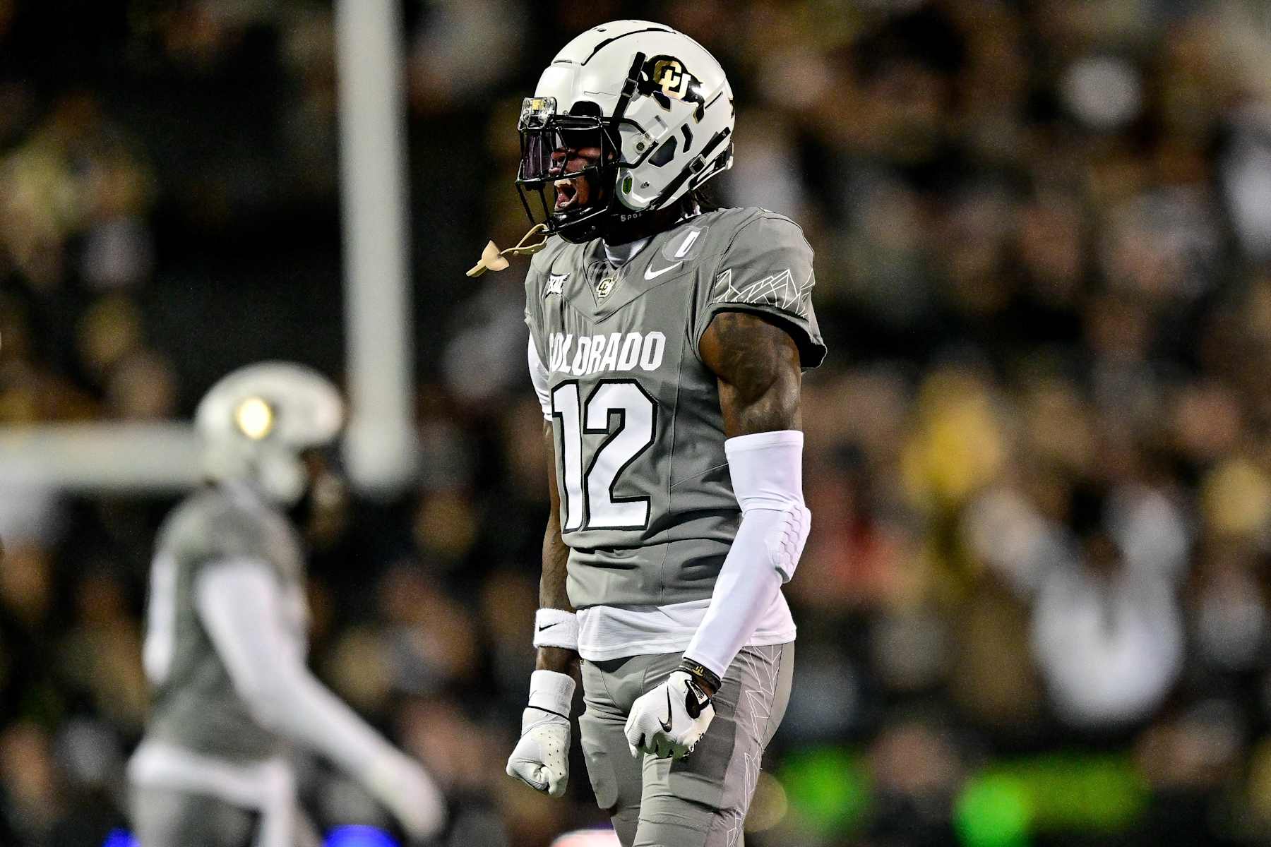 BOULDER, CO - OCTOBER 26:  Travis Hunter #12 of the Colorado Buffaloes celebrates a defensive play in the first quarter against the Cincinnati Bearcats at Folsom Field on October 26, 2024 in Boulder, Colorado. (Photo by Dustin Bradford/Getty Images)