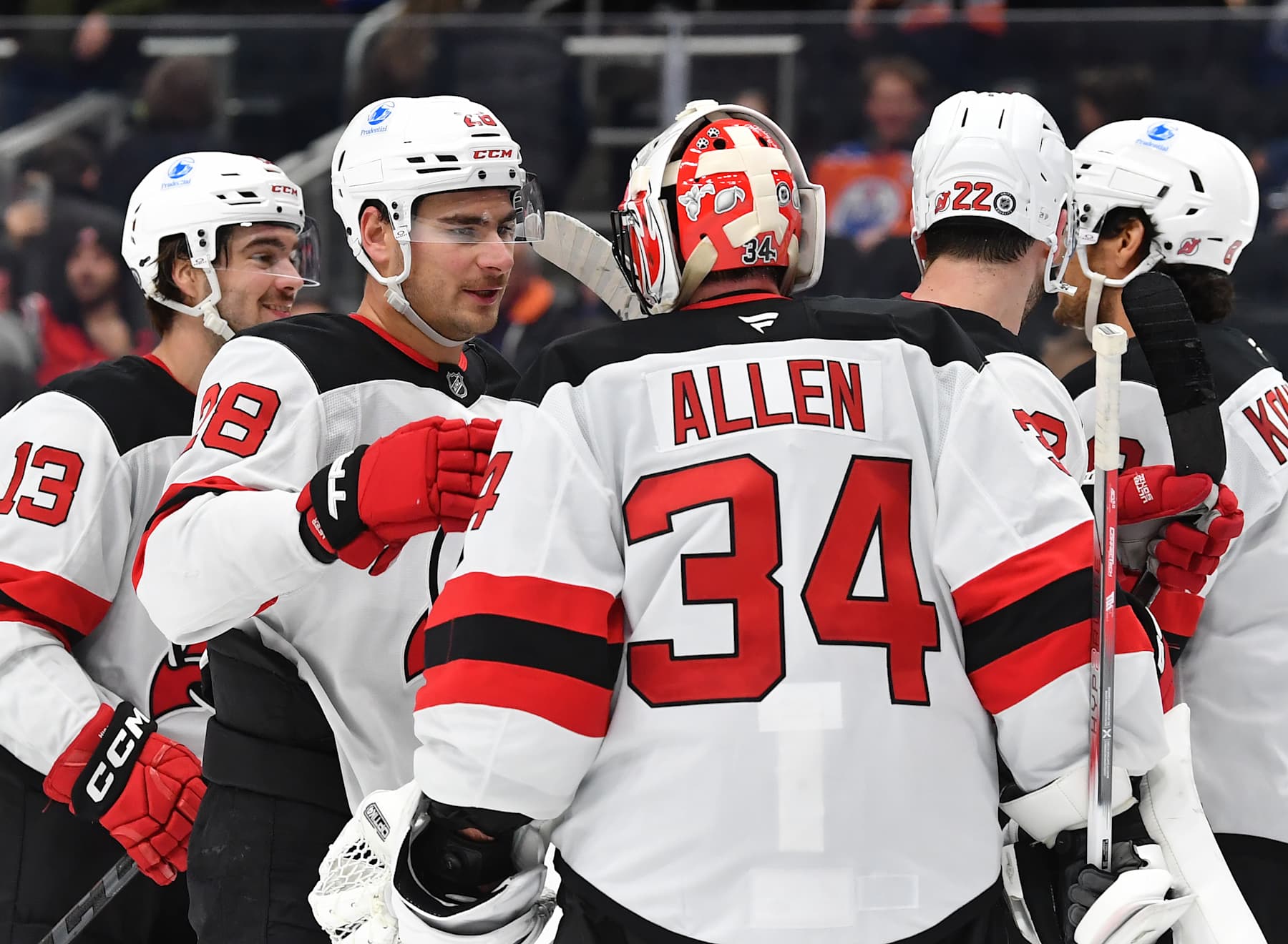 EDMONTON, CANADA - NOVEMBER 4: Nico Hischier #13, Timo Meier #28, Jake Allen #34, Brett Pesce #22 and Johnathan Kovacevic #8 of the New Jersey Devils celebrate a victory over the Edmonton Oilers after the game at Rogers Place on November 4, 2024, in Edmonton, Alberta, Canada. (Photo by Andy Devlin/NHLI via Getty Images)
