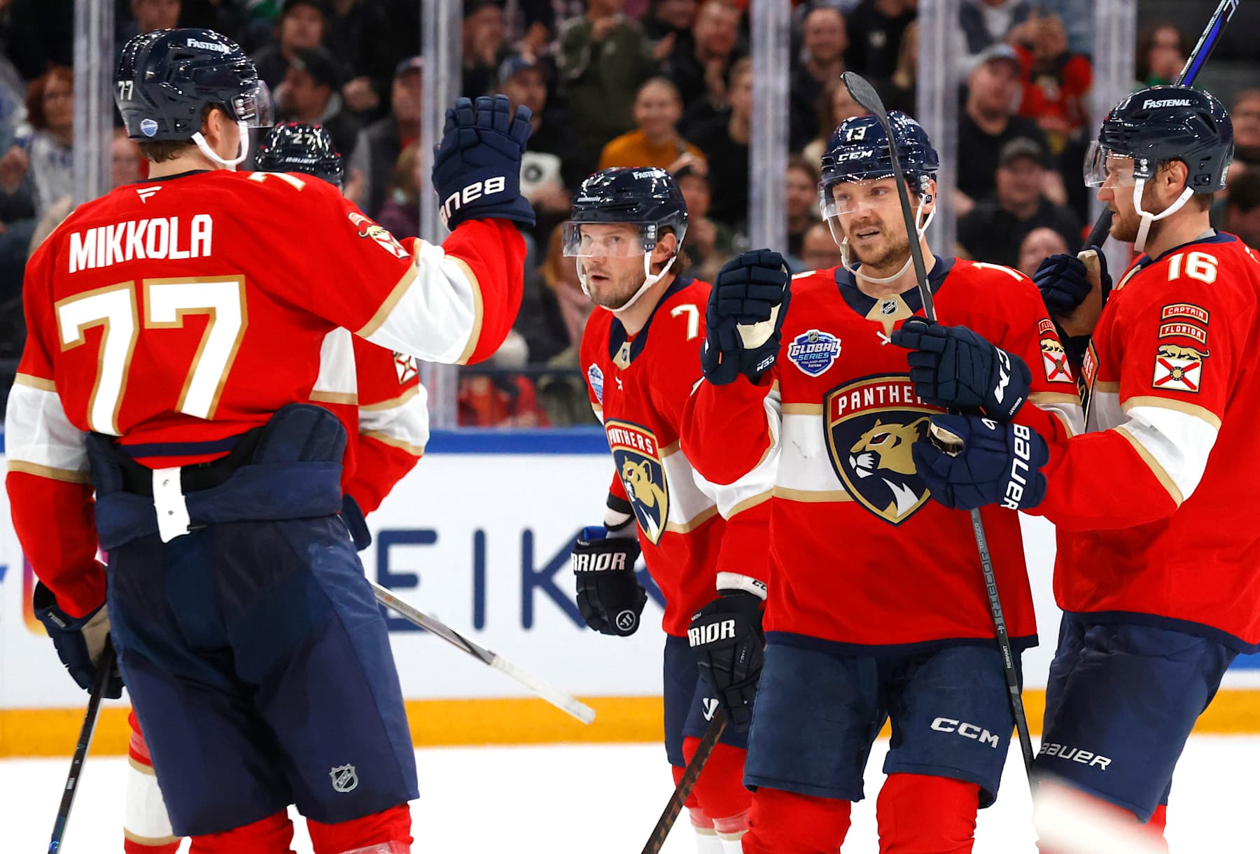 TAMPERE, FINLAND - NOVEMBER 02: Sam Reinhart #13 of the Florida Panthers celebrates his empty net goal with teammatesduring the third period of the 2024 NHL Global Series Finland game between the Dallas Stars and the Florida Panthers at Nokia Arena on November 02, 2024 in Tampere, Finland. (Photo by Eliot J. Schechter/NHLI via Getty Images)