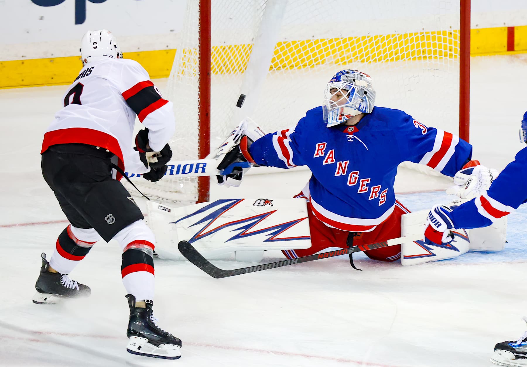 NEW YORK, NY - NOVEMBER 01: New York Rangers Goalie Igor Shesterkin (31) deflects a shot by Ottawa Senators Center Josh Norris (9) during the first period of the National Hockey League game between the Ottawa Senators and the New York Rangers on November 1, 2024 at Madison Square Garden in New York, NY. (Photo by Joshua Sarner/Icon Sportswire via Getty Images)