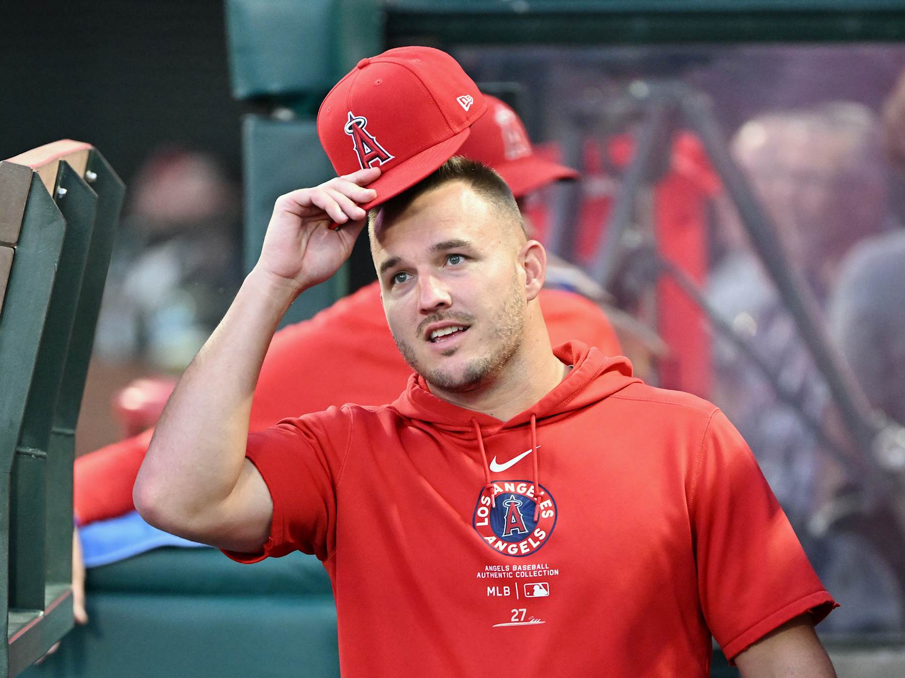 ANAHEIM, CA - SEPTEMBER 28: Los Angeles Angels center fielder Mike Trout (27) in the dugout before the start of an MLB baseball game against the Texas Rangers played on September 28, 2024 at Angel Stadium in Anaheim, CA. (Photo by John Cordes/Icon Sportswire via Getty Images)