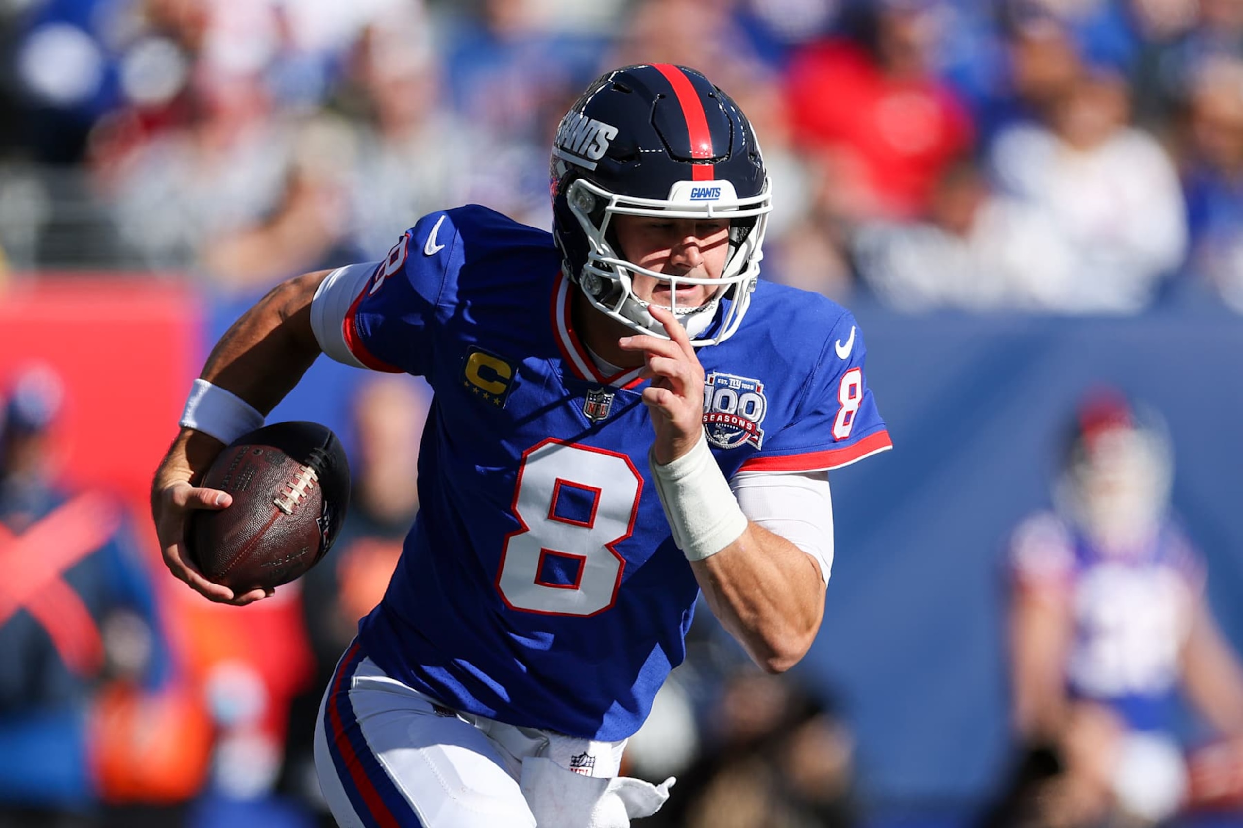EAST RUTHERFORD, NEW JERSEY - NOVEMBER 03: Daniel Jones #8 of the New York Giants runs the ball during the first quarter against the Washington Commanders at MetLife Stadium on November 03, 2024 in East Rutherford, New Jersey. (Photo by Luke Hales/Getty Images)