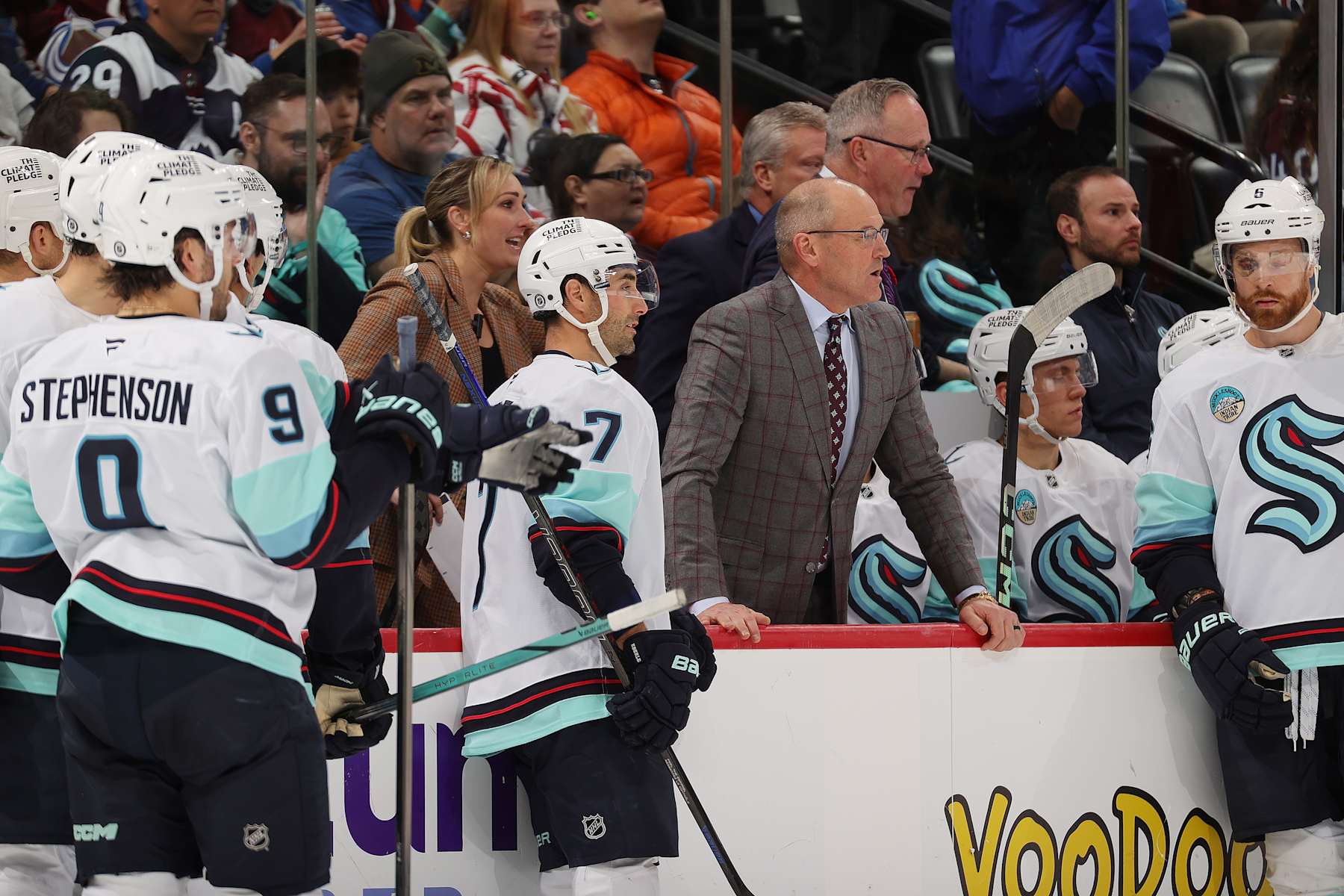 DENVER, COLORADO - NOVEMBER 05: Assistant coach Jessica Campbell, head coach Dan Bylsma and members of the Seattle Kraken talk during a review in the second period against the Colorado Avalanche at Ball Arena on November 5, 2024 in Denver, Colorado. (Photo by Michael Martin/NHLI via Getty Images)
