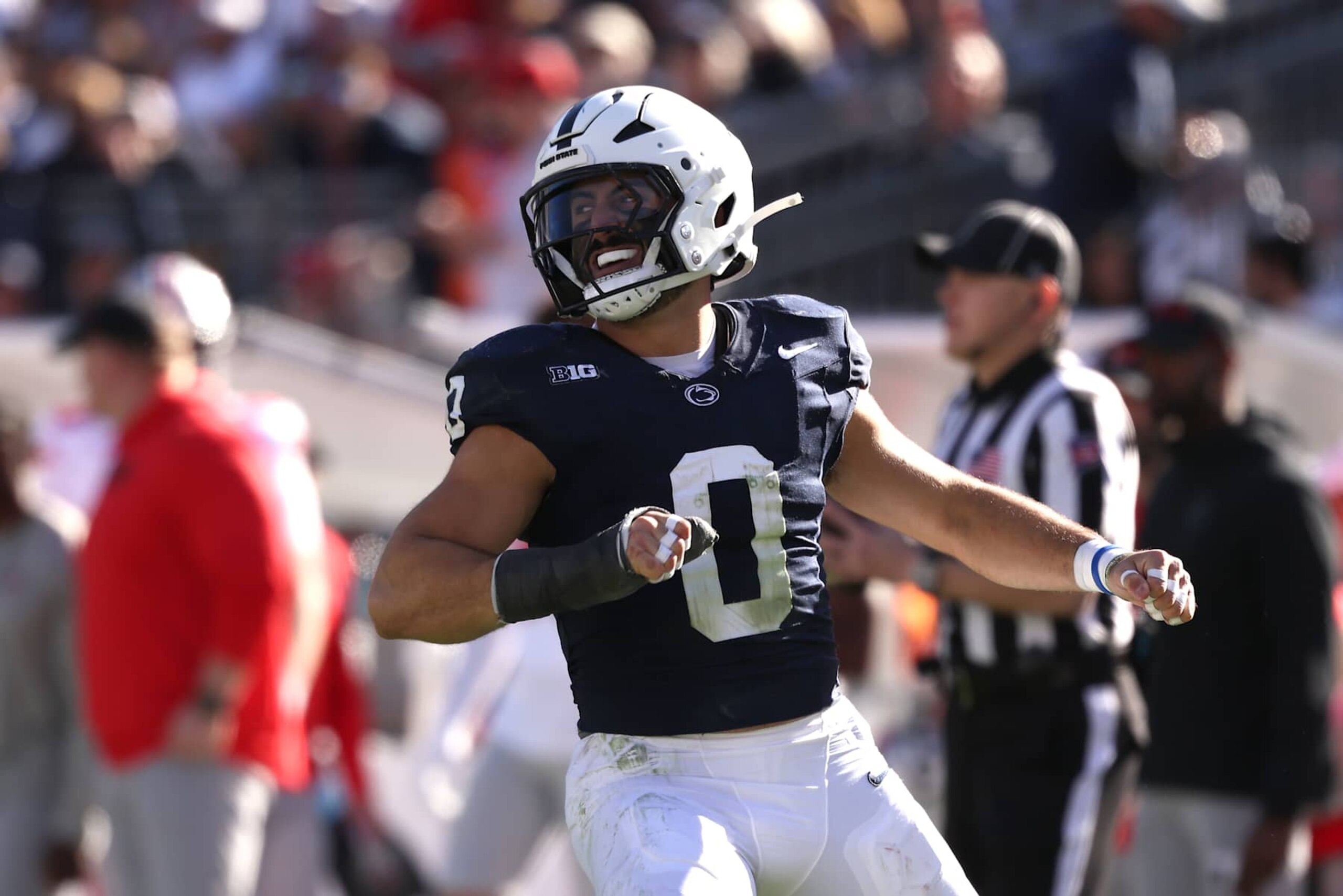 STATE COLLEGE, PENNSYLVANIA - NOVEMBER 02: Dominic DeLuca #0 of the Penn State Nittany Lions celebrates after tackling Will Howard #18 of the Ohio State Buckeyes during the third quarter at Beaver Stadium on November 02, 2024 in State College, Pennsylvania. Ohio State defeated Penn State 20-13 (Photo by Scott Taetsch/Getty Images)
