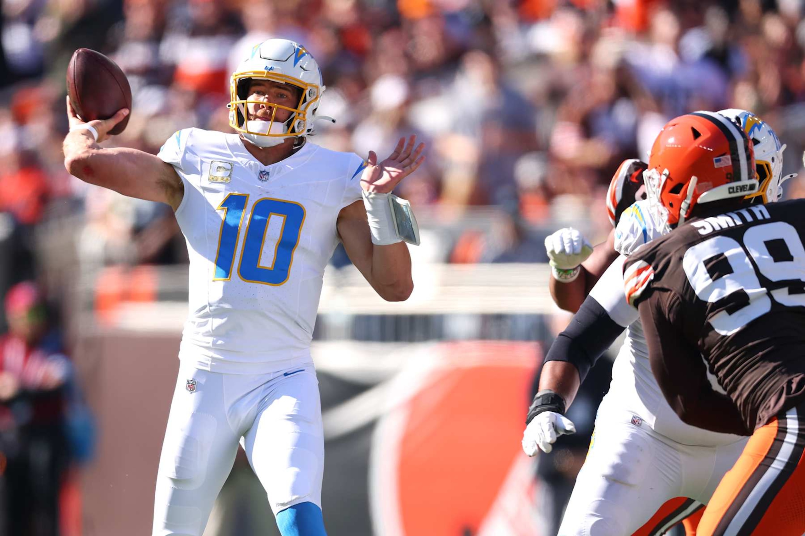 CLEVELAND, OHIO - NOVEMBER 03: Justin Herbert #10 of the Los Angeles Chargers looks to pass in the first quarter of a game against the Cleveland Browns at Huntington Bank Field on November 03, 2024 in Cleveland, Ohio. (Photo by Gregory Shamus/Getty Images)