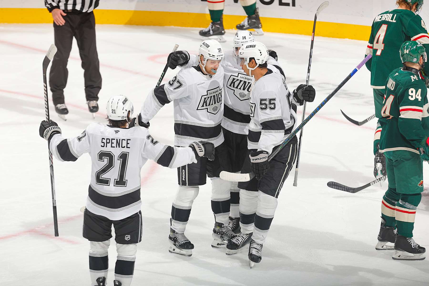 SAINT PAUL, MN - NOVEMBER 5: Warren Foegele #37 celebrates his goal with his teammates Alex Laferriere #14, Quinton Byfield #55 and Jordan Spence #21 of the Los Angeles Kings against the Minnesota Wild during the game at the Xcel Energy Center on November 5, 2024 in Saint Paul, Minnesota. (Photo by Bruce Kluckhohn/NHLI via Getty Images)
