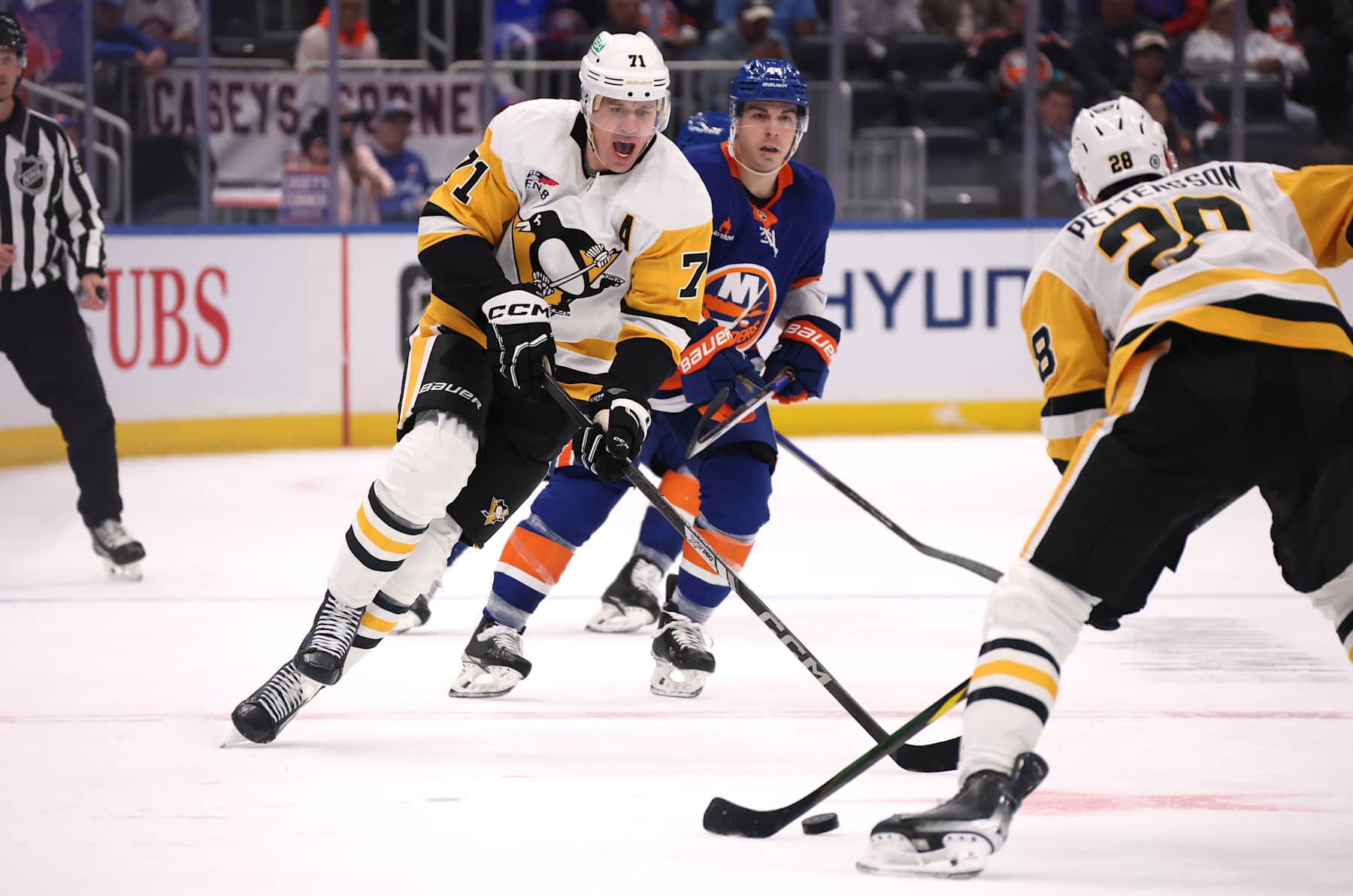 ELMONT, NEW YORK - NOVEMBER 05: Evgeni Malkin #71 of the Pittsburgh Penguins skates against the New York Islanders during their game at UBS Arena on November 05, 2024 in Elmont, New York. (Photo by Al Bello/Getty Images)