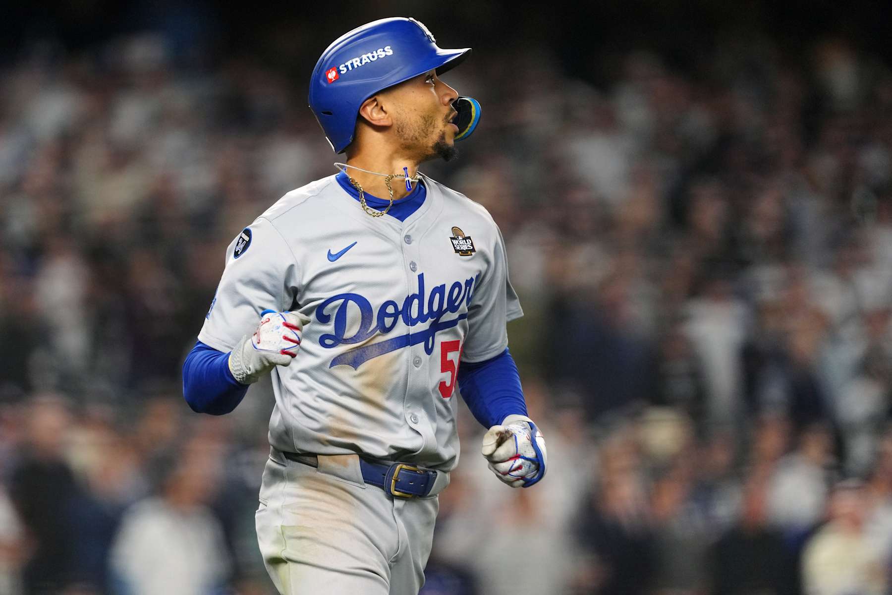 NEW YORK, NY - OCTOBER 30:  Mookie Betts #50 of the Los Angeles Dodgers reacts to hitting a sacrifice fly in the eighth inning during Game 5 of the 2024 World Series presented by Capital One between the Los Angeles Dodgers and the New York Yankees at Yankee Stadium on Wednesday, October 30, 2024 in New York, New York. (Photo by Mary DeCicco/MLB Photos via Getty Images)