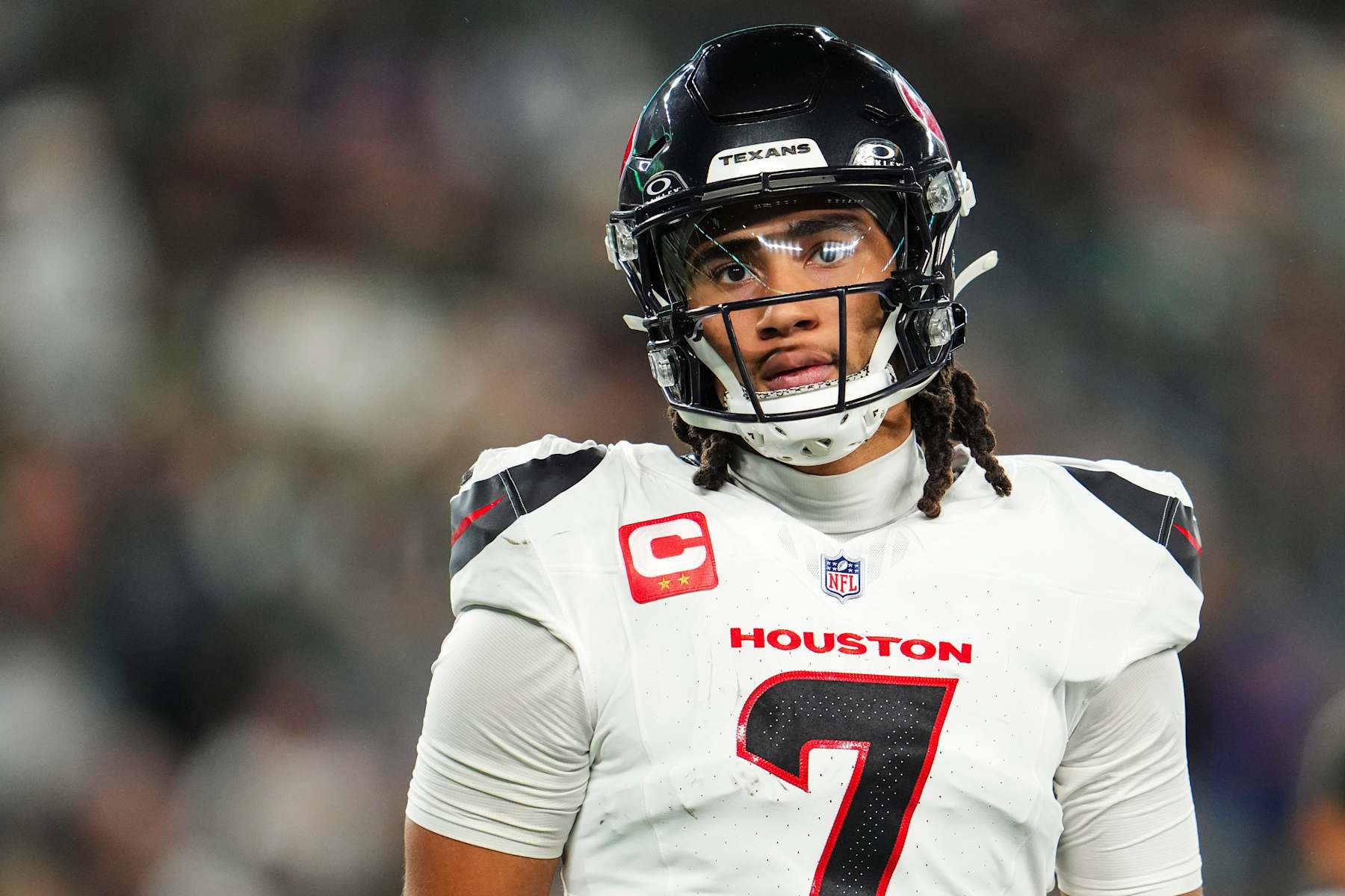 EAST RUTHERFORD, NJ - OCTOBER 31: C.J. Stroud #7 of the Houston Texans looks on from the field during an NFL football game against the New York Jets at MetLife Stadium on October 31, 2024 in East Rutherford, New Jersey. (Photo by Cooper Neill/Getty Images)