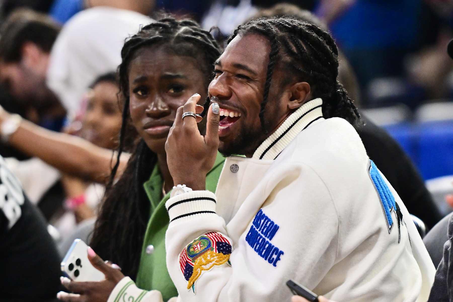 ORLANDO, FLORIDA - OCTOBER 18: Team USA gold medalist Noah Lyles reacts during a preseason NBA game between the Orlando Magic and the Philadelphia 76ers at Kia Center on October 18, 2024 in Orlando, Florida. NOTE TO USER: User expressly acknowledges and agrees that, by downloading and or using this photograph, User is consenting to the terms and conditions of the Getty Images License Agreement. (Photo by Julio Aguilar/Getty Images)