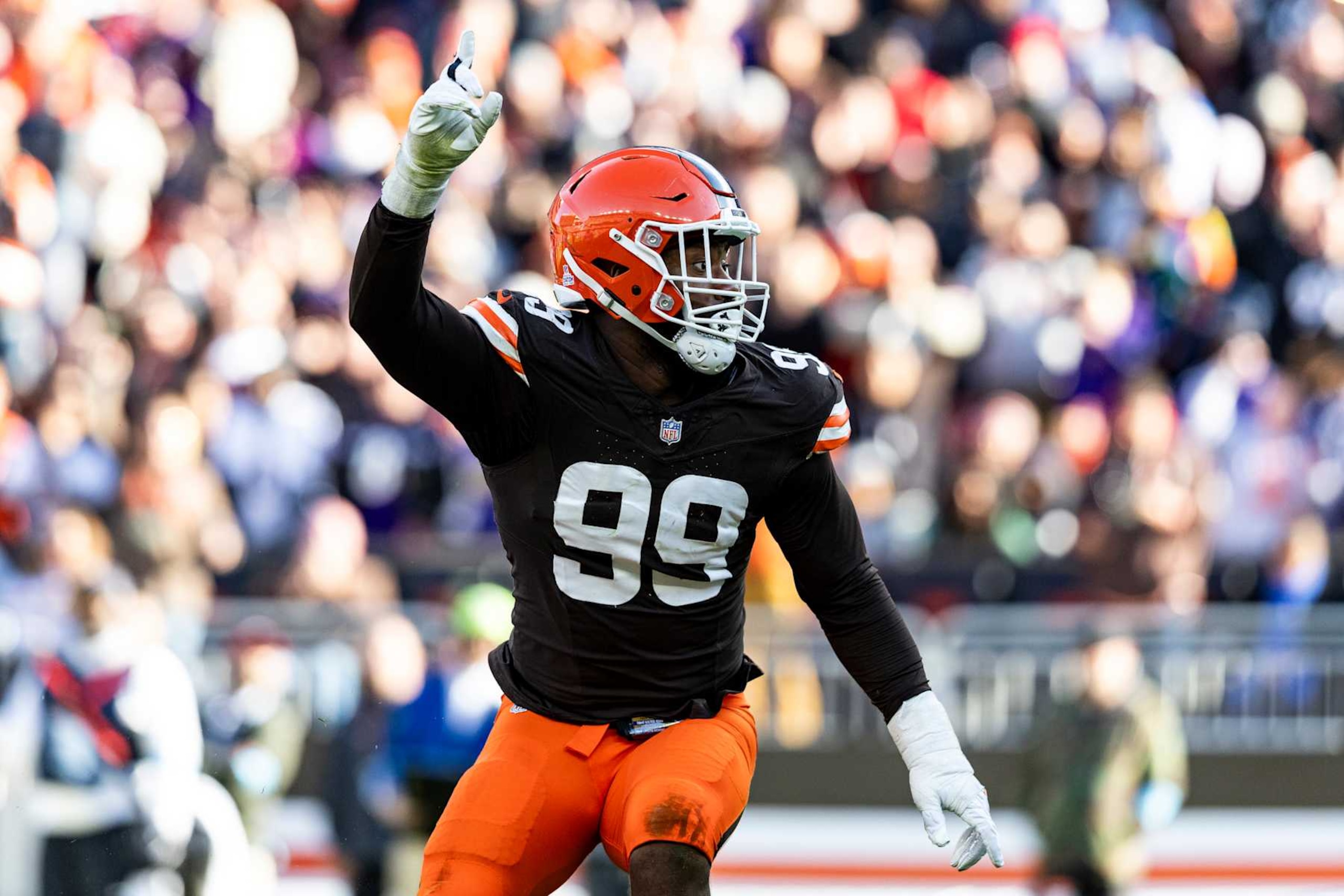 CLEVELAND, OHIO - OCTOBER 27: Za'Darius Smith #99 of the Cleveland Browns celebrates after sacking Lamar Jackson #8 of the Baltimore Ravens in the fourth quarter at Huntington Bank Field on October 27, 2024 in Cleveland, Ohio. The Browns beat the Ravens 29-24. (Photo by Lauren Leigh Bacho/Getty Images)
