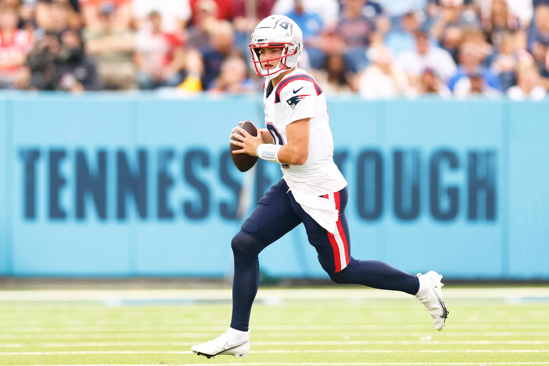 NASHVILLE, TENNESSEE - NOVEMBER 03: Drake Maye #10 of the New England Patriots runs with the ball during the first half of the game between the Tennessee Titans and the New England Patriots at Nissan Stadium on November 03, 2024 in Nashville, Tennessee. (Photo by Johnnie Izquierdo/Getty Images)