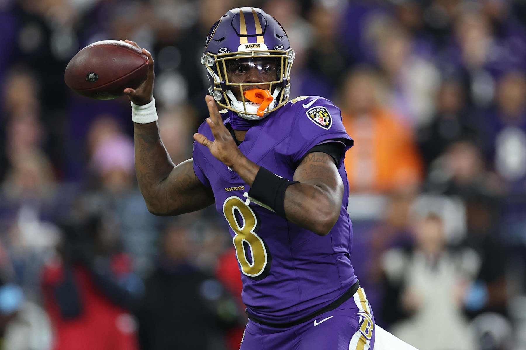 BALTIMORE, MARYLAND - NOVEMBER 07: Lamar Jackson #8 of the Baltimore Ravens passes the ball against the Cincinnati Bengals during the second quarter at M&T Bank Stadium on November 07, 2024 in Baltimore, Maryland. (Photo by Scott Taetsch/Getty Images)
