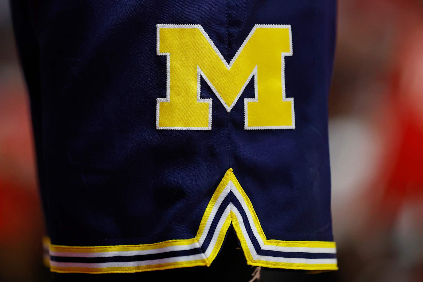 PISCATAWAY, NEW JERSEY - FEBRUARY 29: The Michigan Wolverines logo on the uniform shorts worn during a game against the Rutgers Scarlet Knights at Jersey Mike's Arena on February 29, 2024 in Piscataway, New Jersey. Rutgers defeated Michigan 82-52. (Photo by Rich Schultz/Getty Images)