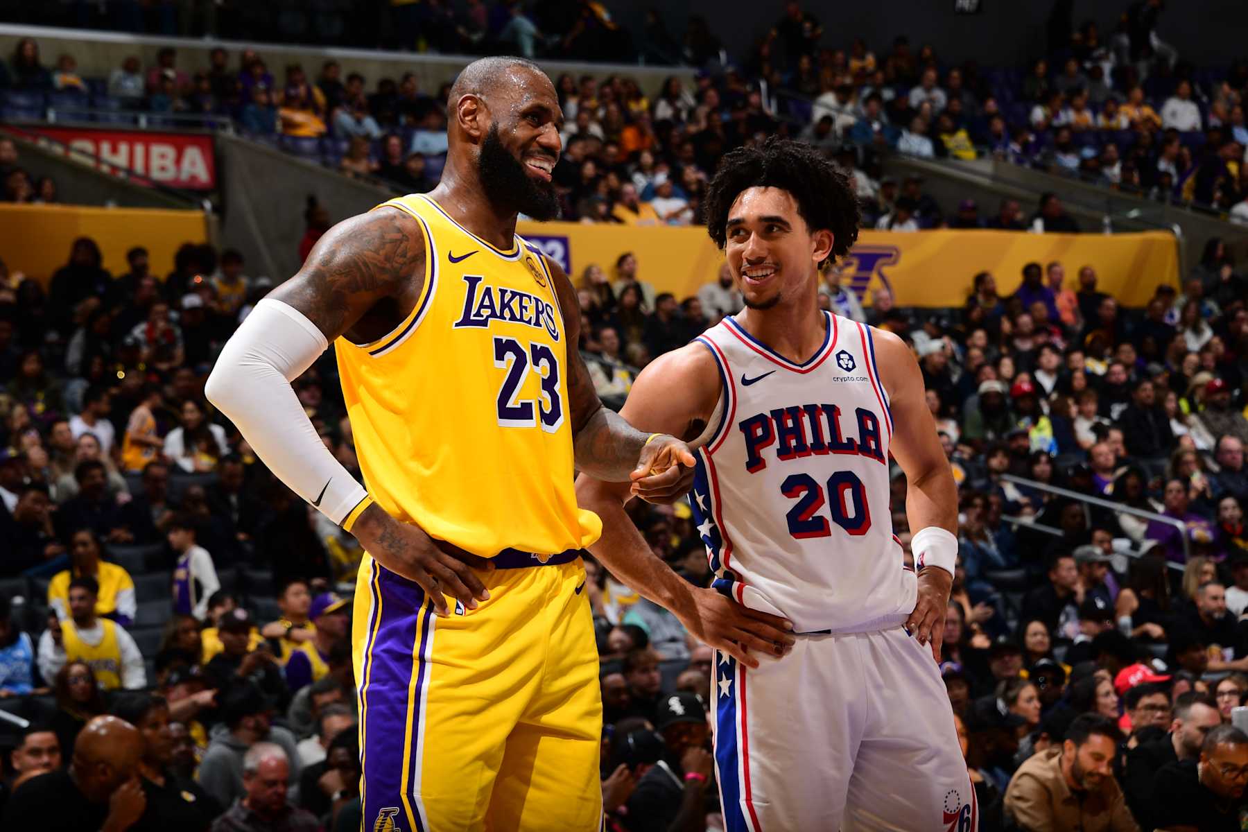 LOS ANGELES, CA - NOVEMBER 8: LeBron James #23 of the Los Angeles Lakers and Jared McCain #20 of the Philadelphia 76ers talk during the game between the Philadelphia 76ers and the Los Angeles Lakers on November 8, 2024 at Crypto.Com Arena in Los Angeles, California. NOTE TO USER: User expressly acknowledges and agrees that, by downloading and/or using this Photograph, user is consenting to the terms and conditions of the Getty Images License Agreement. Mandatory Copyright Notice: Copyright 2024 NBAE (Photo by Adam Pantozzi/NBAE via Getty Images)