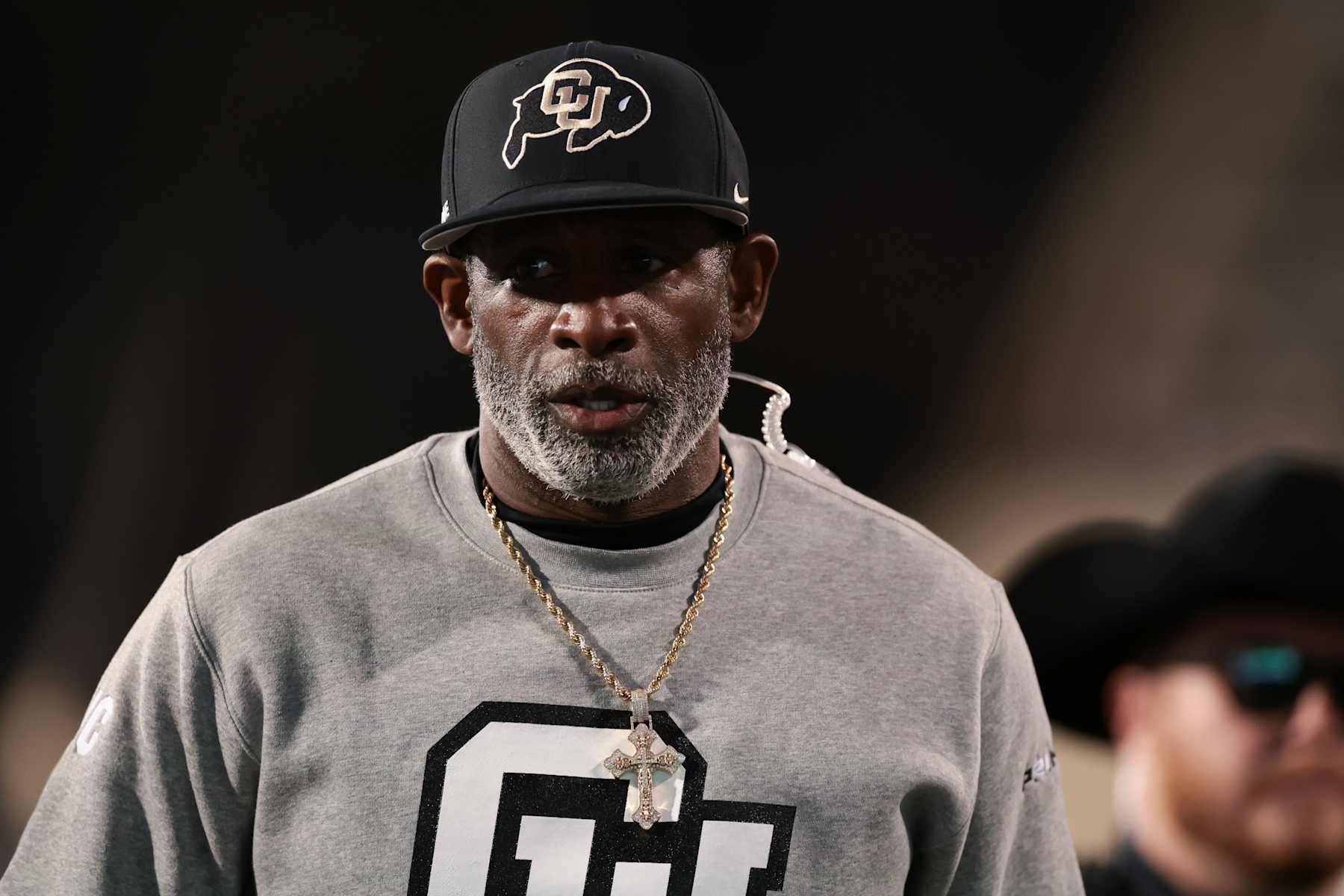BOULDER, COLORADO - OCTOBER 26: Head coach Deion Sanders of the Colorado Buffaloes walks the field prior to the game against the Cincinnati Bearcats at Folsom Field on October 26, 2024 in Boulder, Colorado. (Photo by Andrew Wevers/Getty Images)