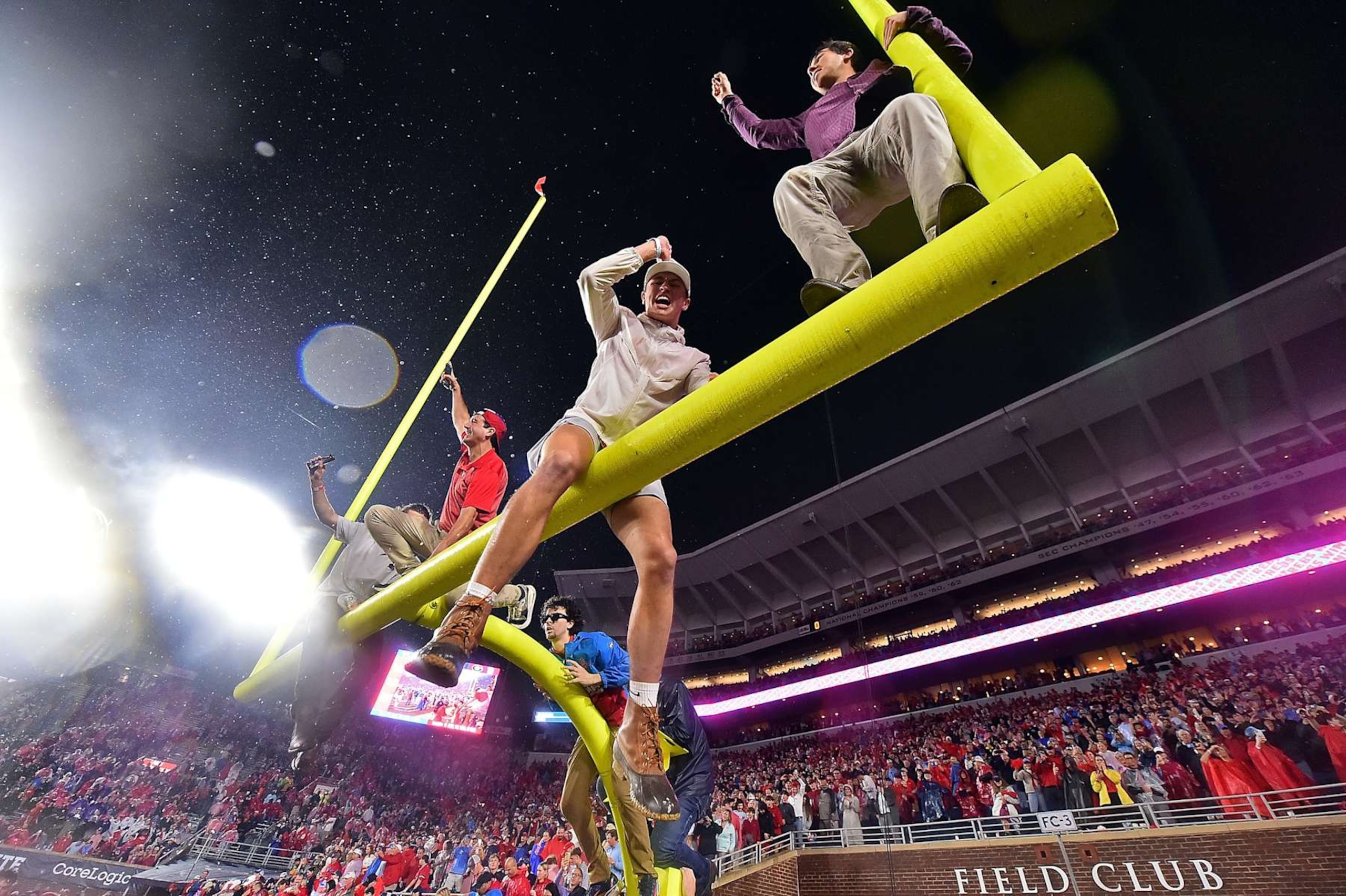 OXFORD, MISSISSIPPI - NOVEMBER 09: Fans sit atop the field goal after the game between the Mississippi Rebels and the Georgia Bulldogs at Vaught-Hemingway Stadium on November 09, 2024 in Oxford, Mississippi. Ole Miss defeated Georgia 28-10. (Photo by Justin Ford/Getty Images) OXFORD, MISSISSIPPI - NOVEMBER 09: Fans sit atop the field goal after the game between the Mississippi Rebels and the Georgia Bulldogs at Vaught-Hemingway Stadium on November 09, 2024 in Oxford, Mississippi. Ole Miss defeated Georgia 28-10. (Photo by Justin Ford/Getty Images)