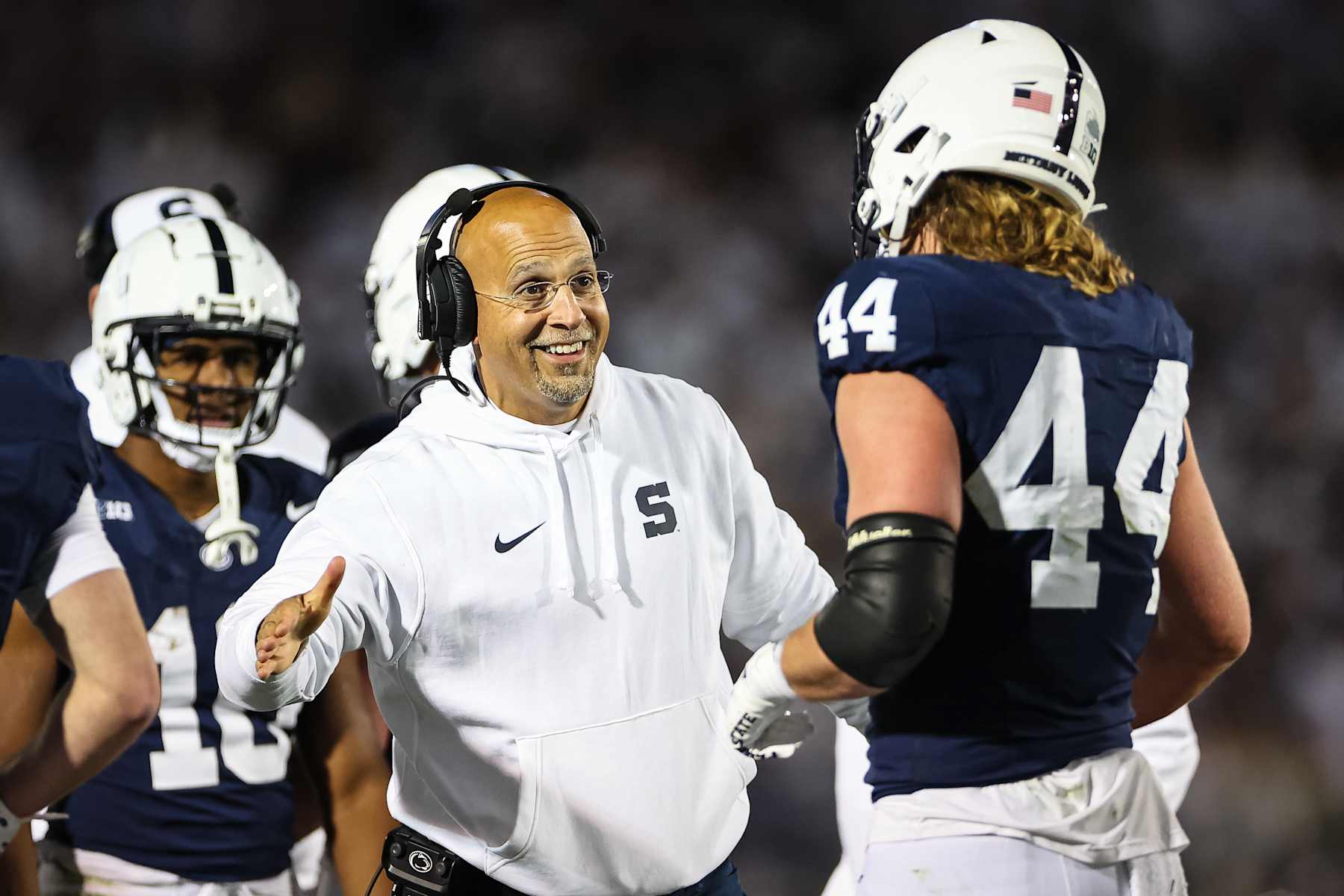 STATE COLLEGE, PA - NOVEMBER 09: Tyler Warren #44 of the Penn State Nittany Lions celebrates with head coach James Franklin after scoring a touchdown against the Washington Huskies during the first half at Beaver Stadium on November 09, 2024 in State College, Pennsylvania. (Photo by Scott Taetsch/Getty Images)