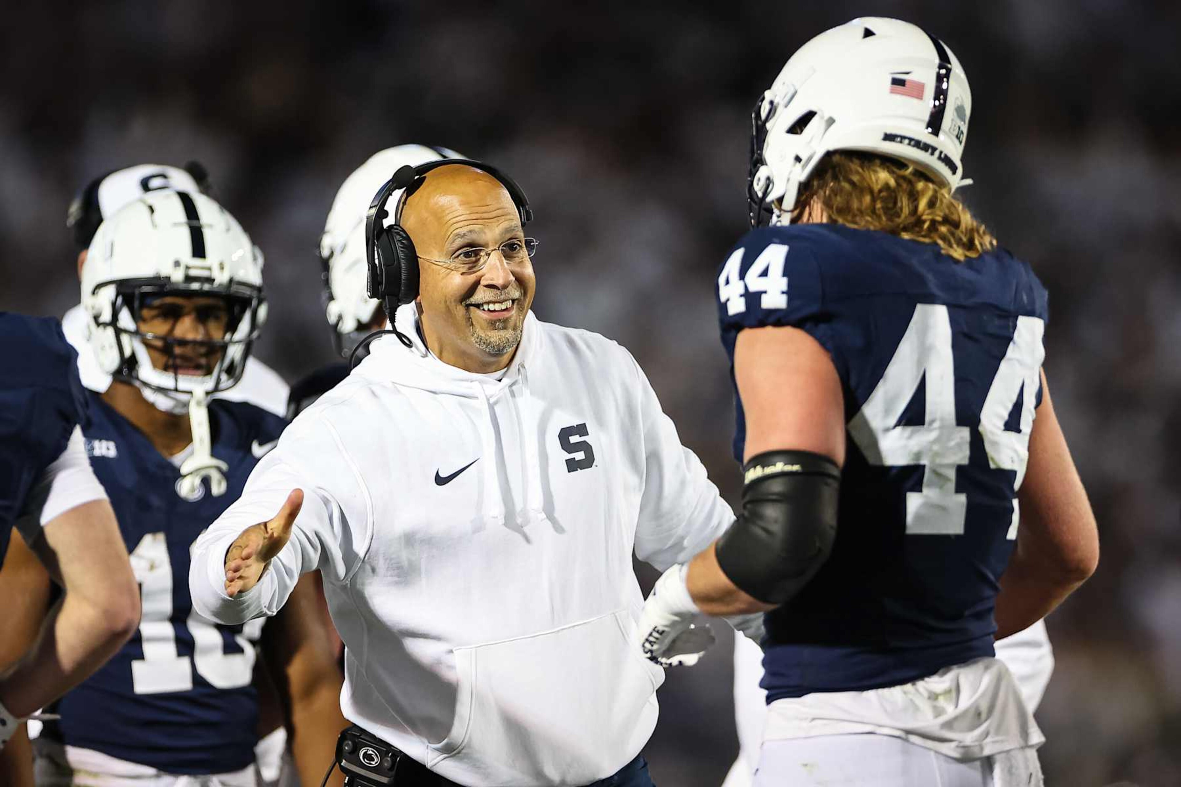STATE COLLEGE, PA - NOVEMBER 09: Tyler Warren #44 of the Penn State Nittany Lions celebrates with head coach James Franklin after scoring a touchdown against the Washington Huskies during the first half at Beaver Stadium on November 09, 2024 in State College, Pennsylvania. (Photo by Scott Taetsch/Getty Images)