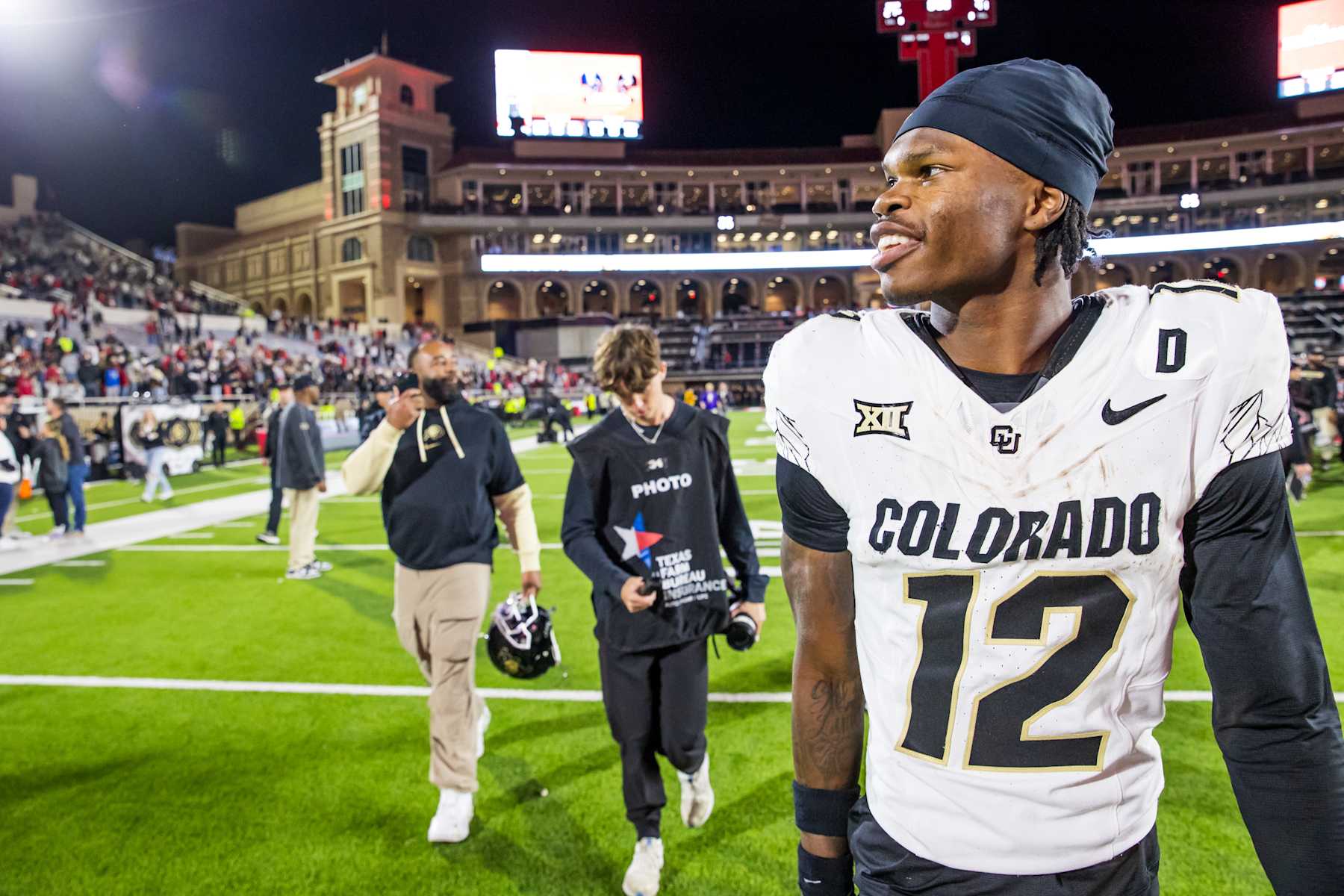 LUBBOCK, TEXAS - NOVEMBER 09: Travis Hunter #12 of the Colorado Buffaloes walks across the field after the game against the Texas Tech Red Raiders at Jones AT&T Stadium on November 09, 2024 in Lubbock, Texas. (Photo by John E. Moore III/Getty Images)