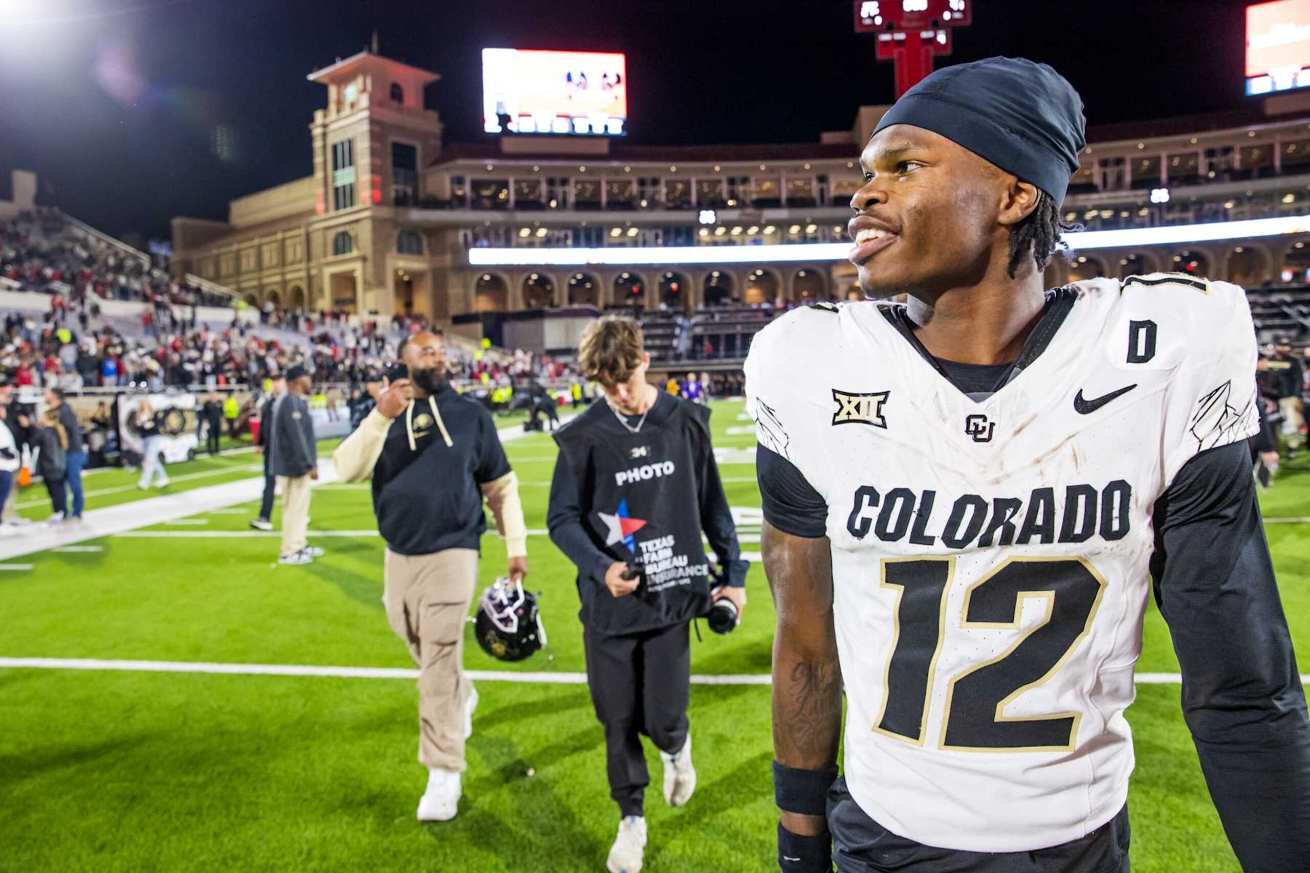 LUBBOCK, TEXAS - NOVEMBER 09: Travis Hunter #12 of the Colorado Buffaloes walks across the field after the game against the Texas Tech Red Raiders at Jones AT&T Stadium on November 09, 2024 in Lubbock, Texas. (Photo by John E. Moore III/Getty Images) LUBBOCK, TEXAS - NOVEMBER 09: Travis Hunter #12 of the Colorado Buffaloes walks across the field after the game against the Texas Tech Red Raiders at Jones AT&T Stadium on November 09, 2024 in Lubbock, Texas. (Photo by John E. Moore III/Getty Images)