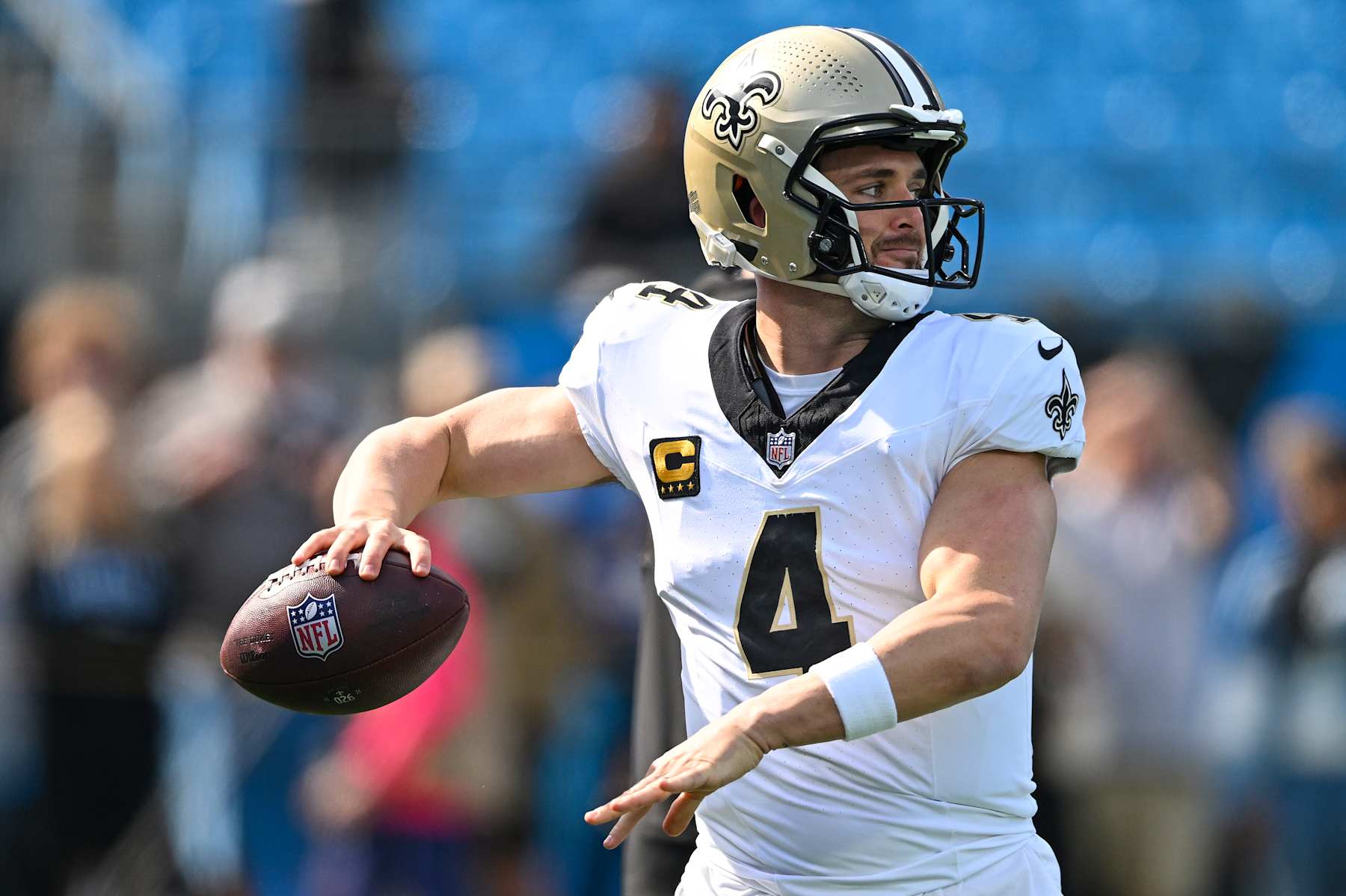 CHARLOTTE, NORTH CAROLINA - NOVEMBER 03: Derek Carr #4 of the New Orleans Saints warms up prior to the game against the Carolina Panthers at Bank of America Stadium on November 03, 2024 in Charlotte, North Carolina. (Photo by Matt Kelley/Getty Images)