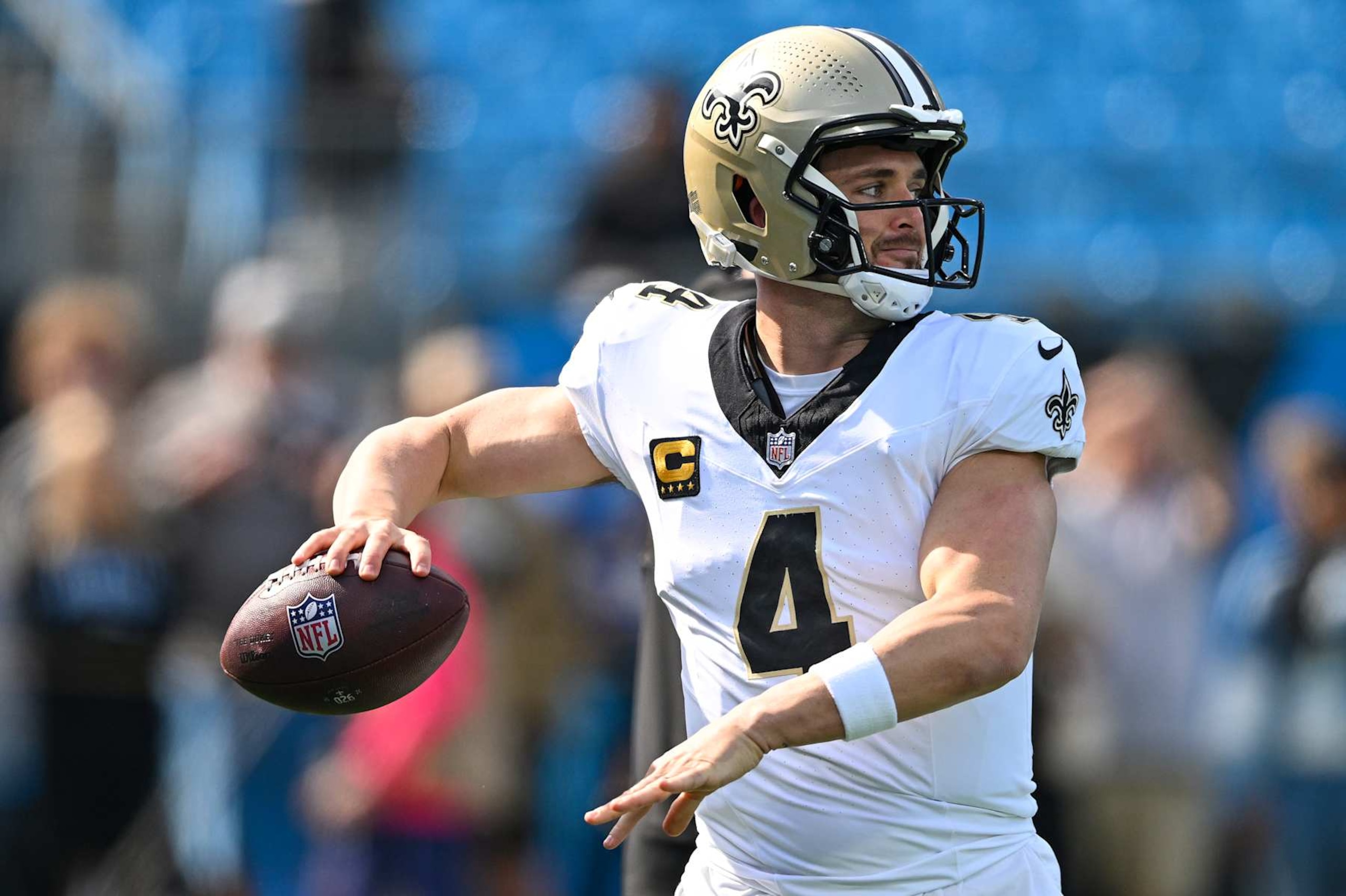 CHARLOTTE, NORTH CAROLINA - NOVEMBER 03: Derek Carr #4 of the New Orleans Saints warms up prior to the game against the Carolina Panthers at Bank of America Stadium on November 03, 2024 in Charlotte, North Carolina. (Photo by Matt Kelley/Getty Images)