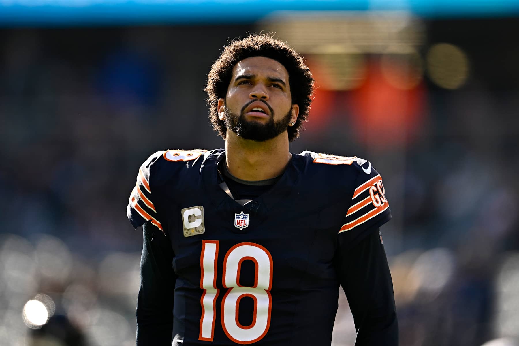 CHICAGO, ILLINOIS - NOVEMBER 10: Caleb Williams #18 of the Chicago Bears looks on before the game against the New England Patriots at Soldier Field on November 10, 2024 in Chicago, Illinois. (Photo by Quinn Harris/Getty Images)